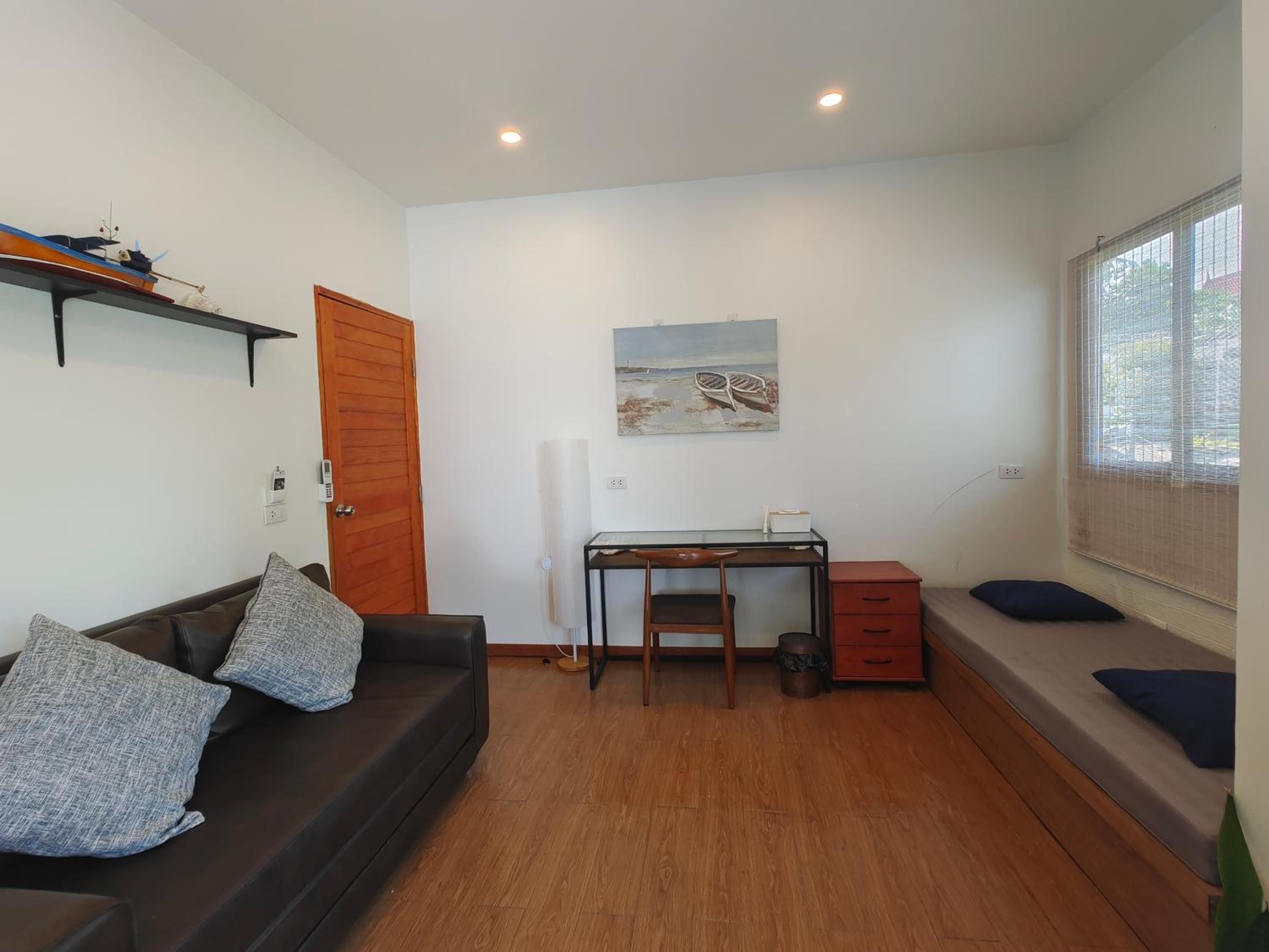Three-Bedroom House - Photo 49