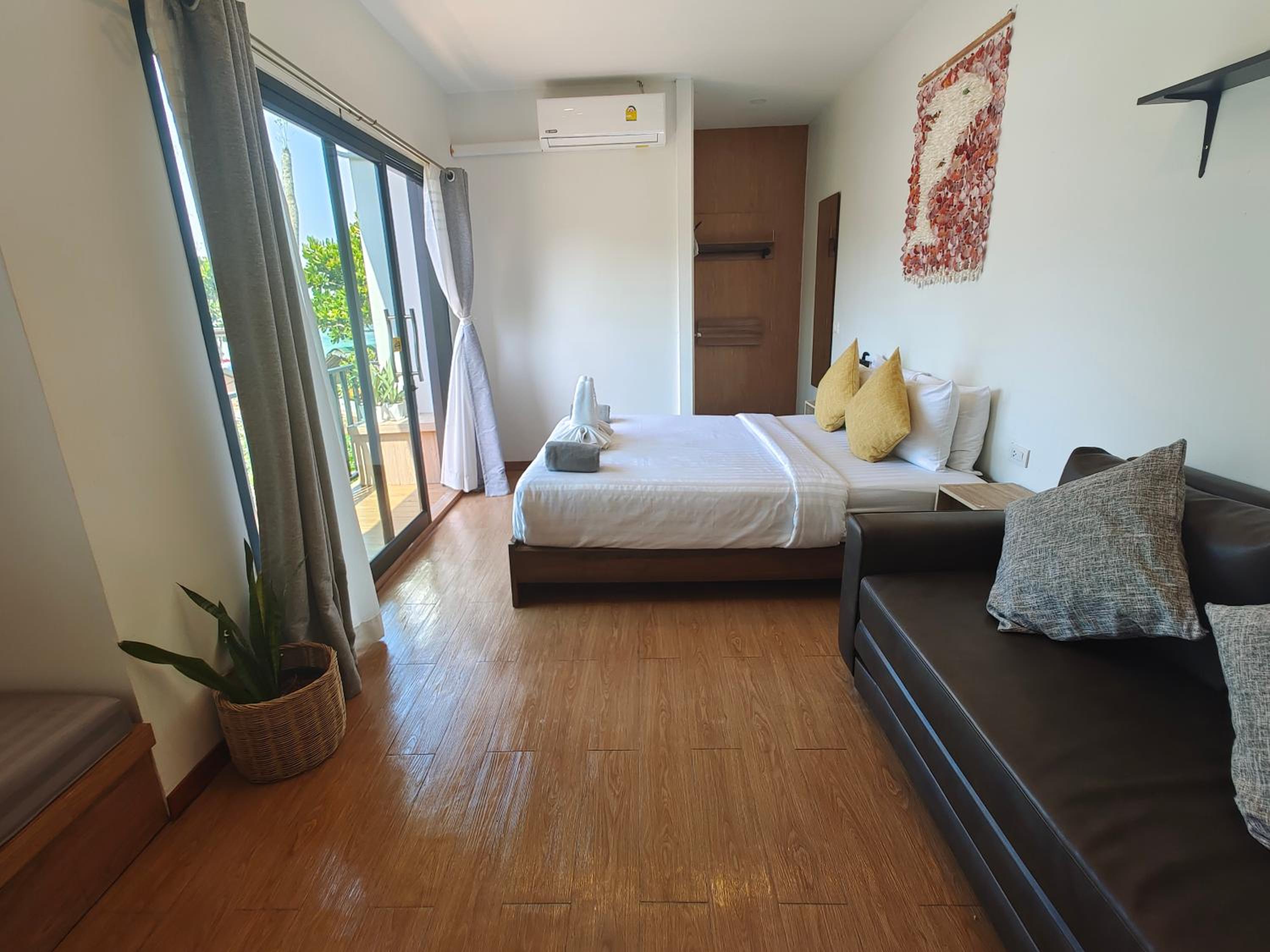 Three-Bedroom House - Photo 38