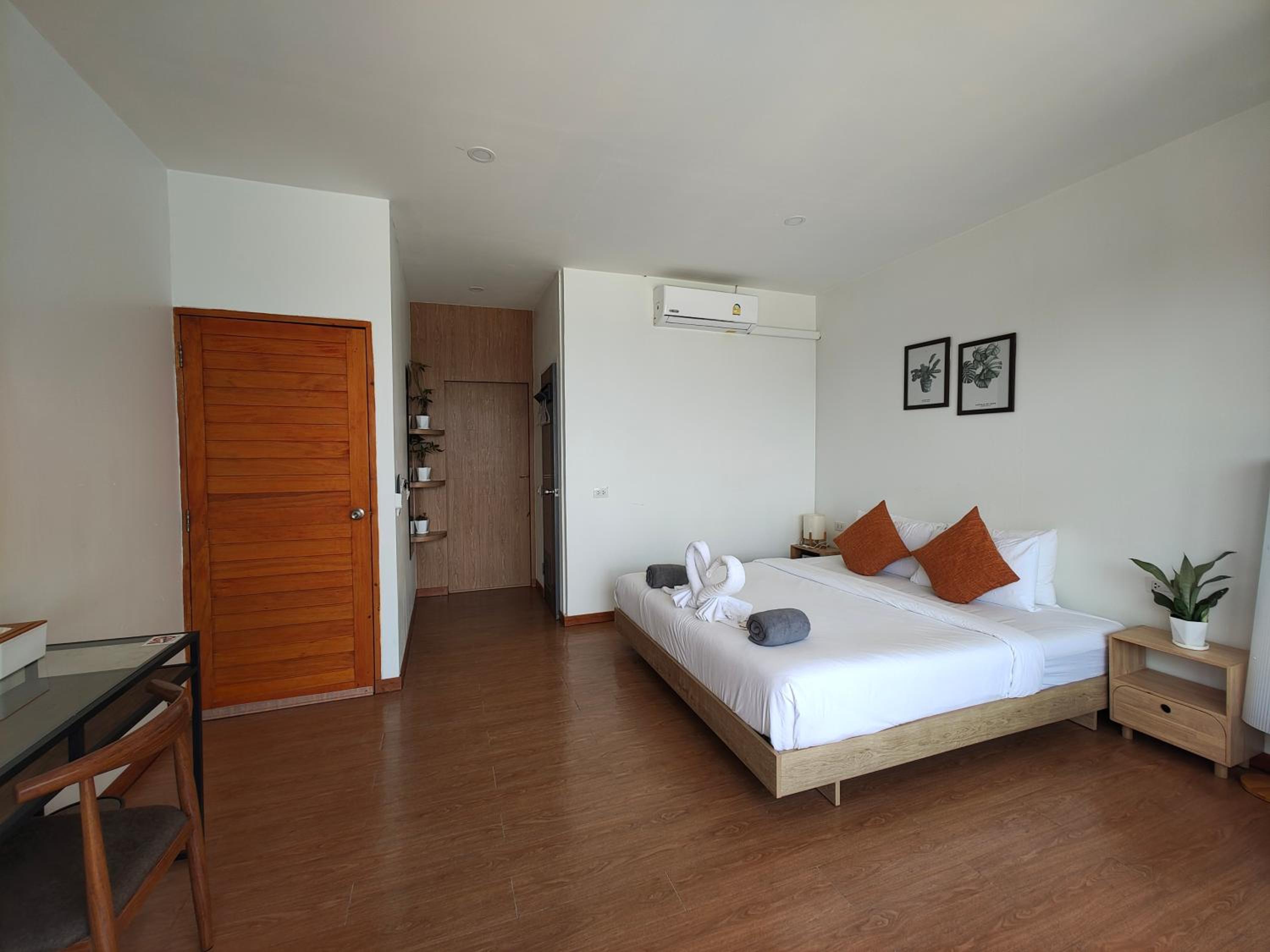 Three-Bedroom House - Photo 35