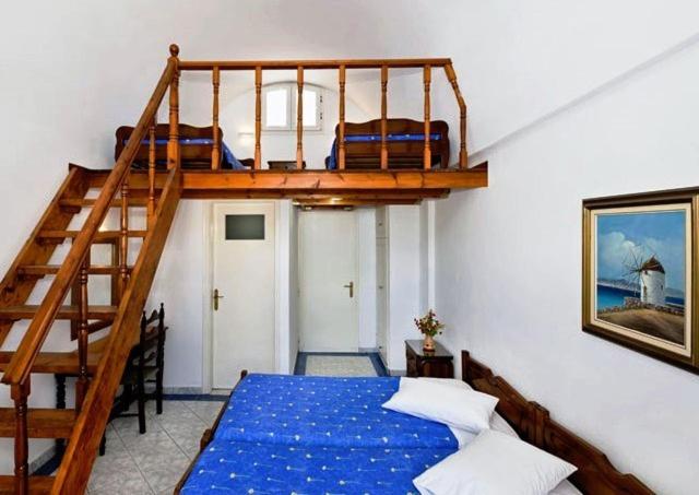 Quadruple Room - Photo 1