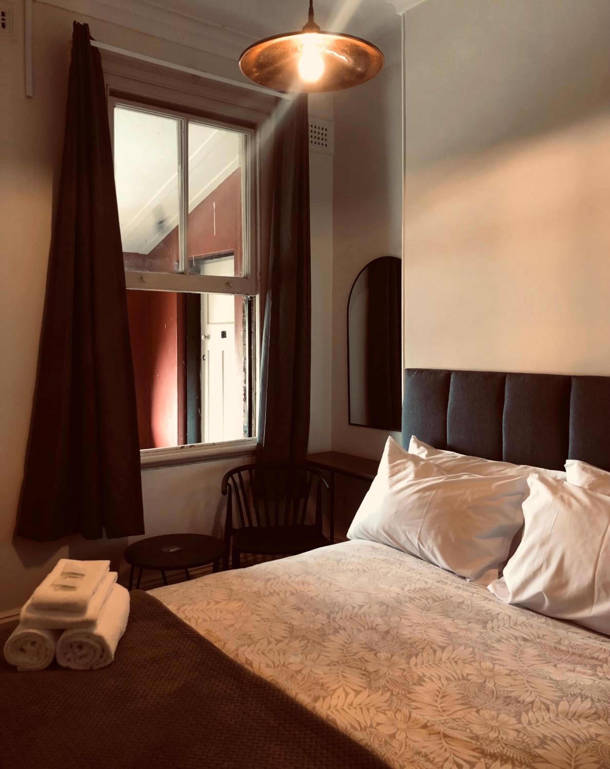 Queen Room with Shared Bathroom