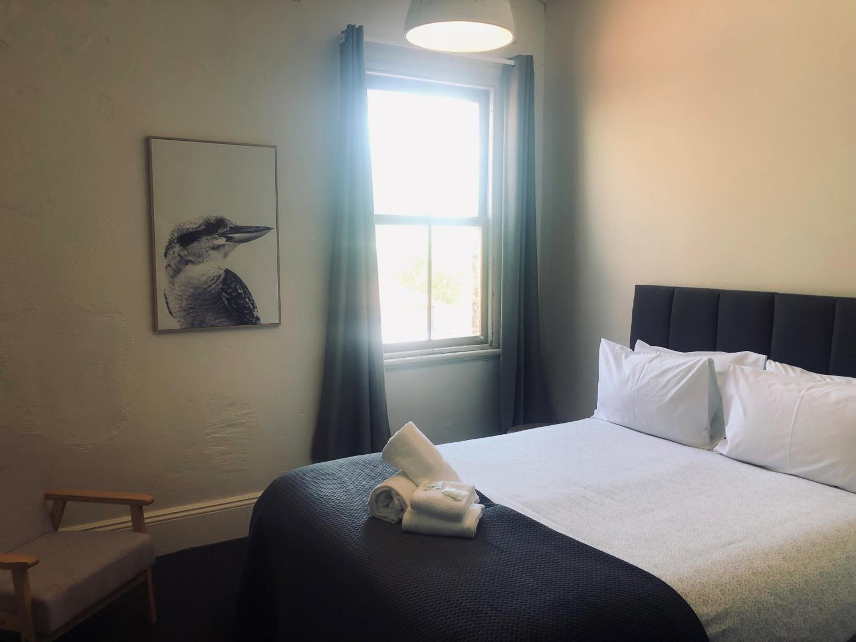 Queen Room with Shared Bathroom