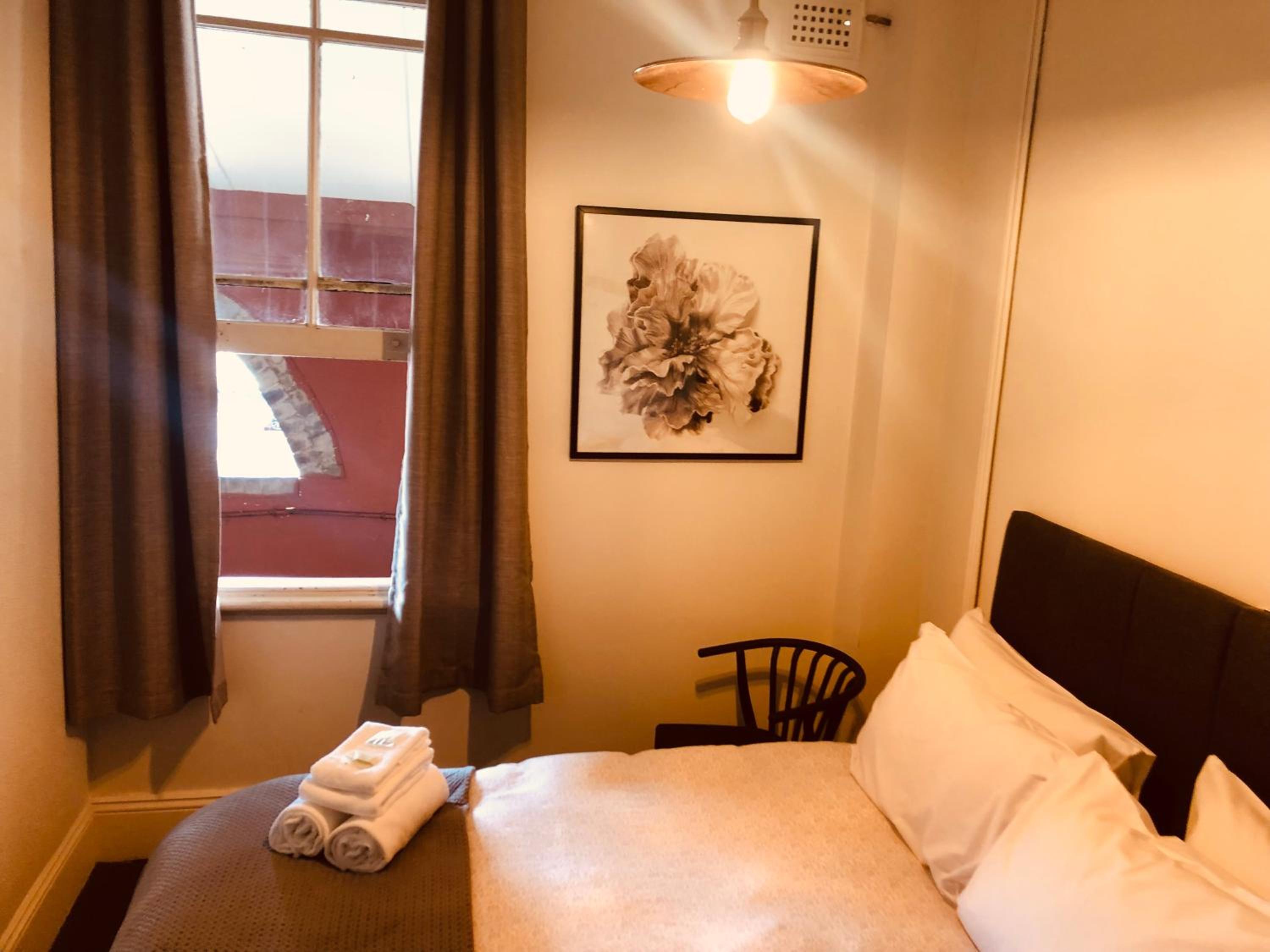 Queen Room with Shared Bathroom