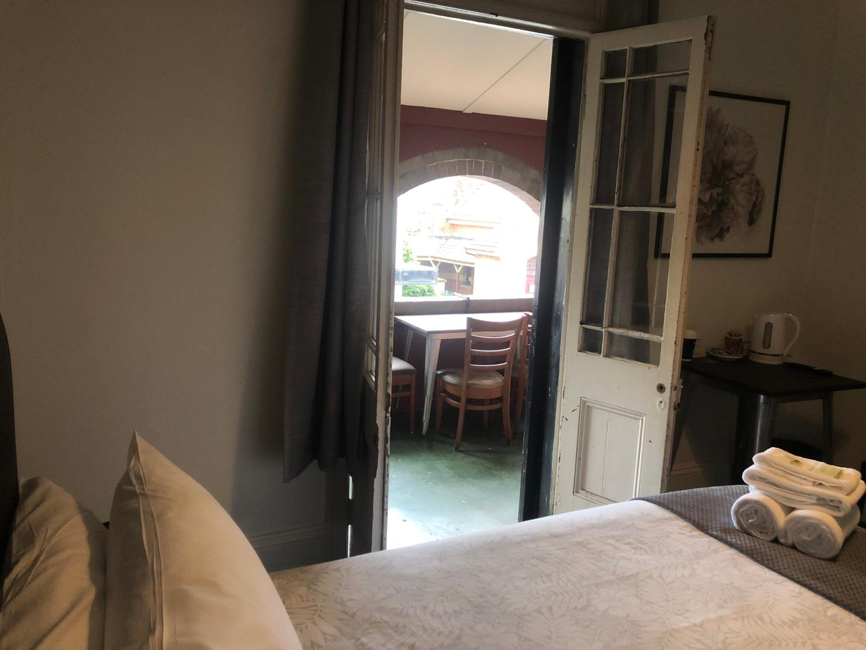 Queen Room with Shared Bathroom