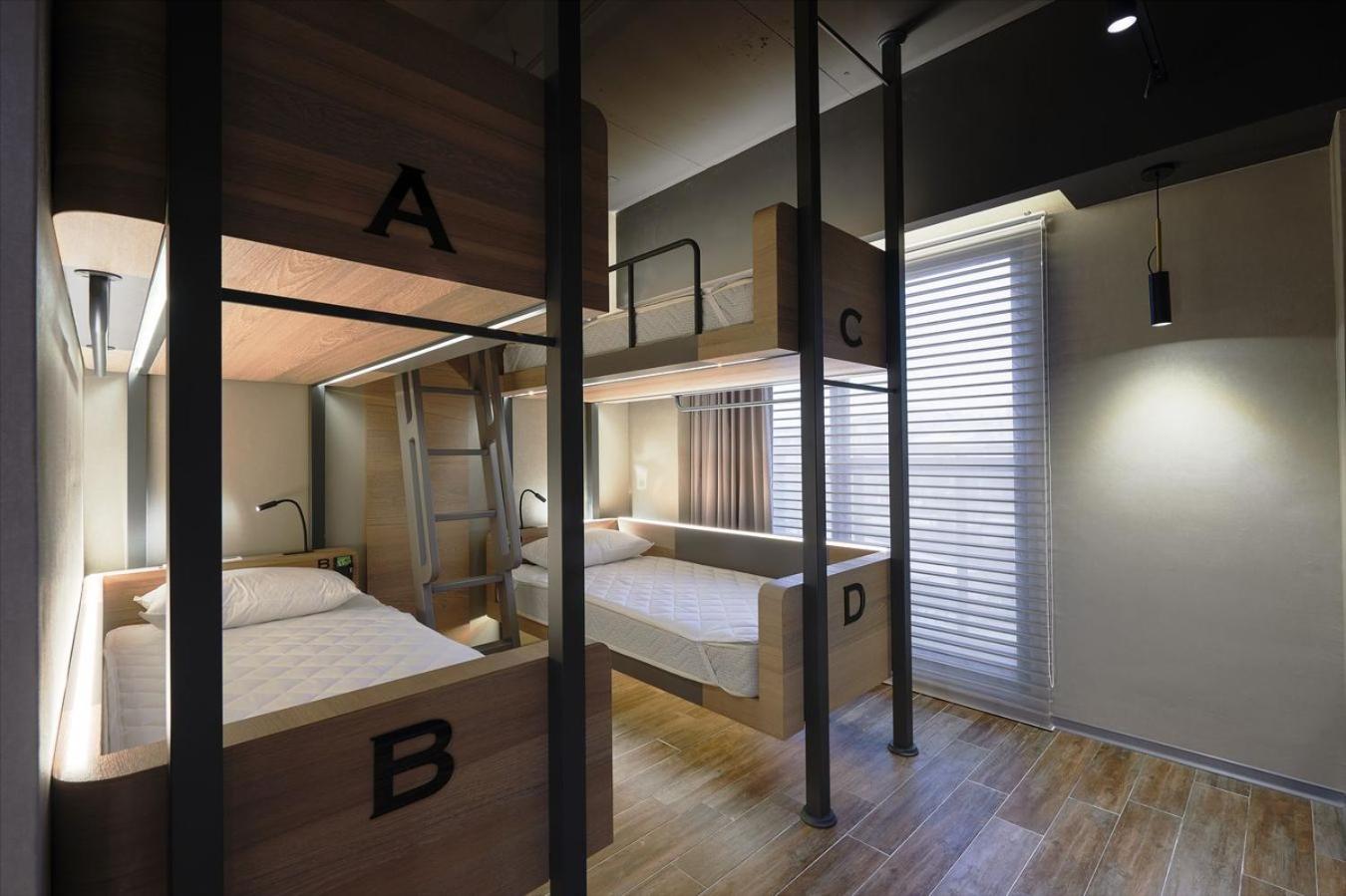 Upper Bunk Bed in Female Dormitory Room photo 1