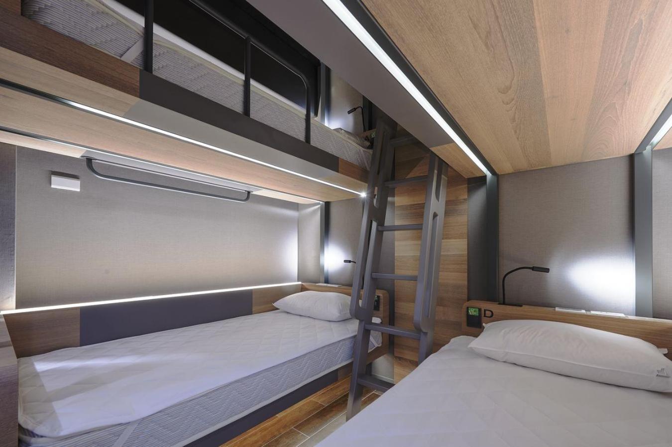 Lower Bunk Bed in Male Dormitory Room photo 3