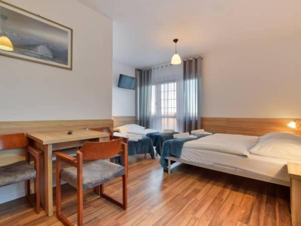 Quadruple Room - Photo 1