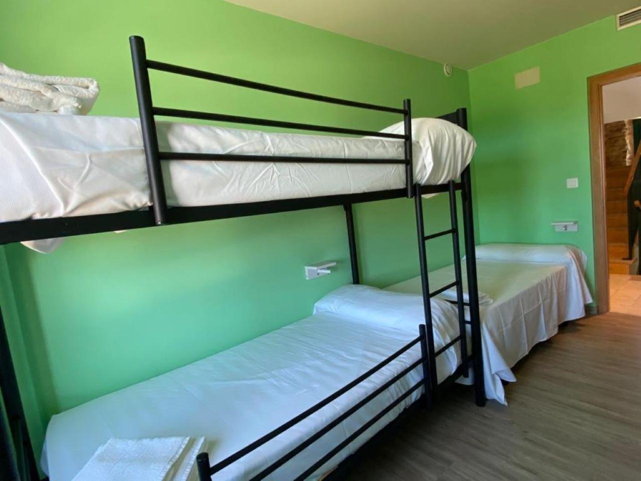 Cama individual en habitación compartida mixta