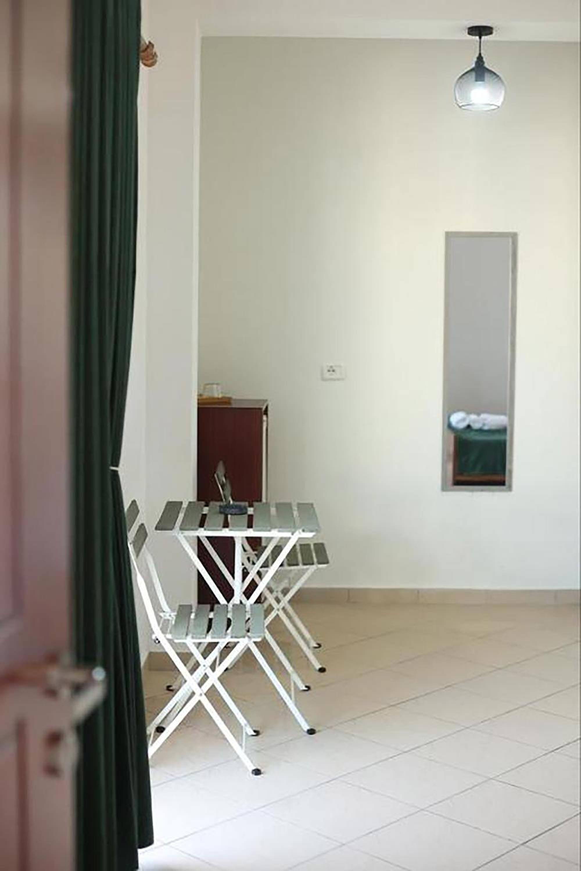 Quadruple Room with Shared Balcony photo 3