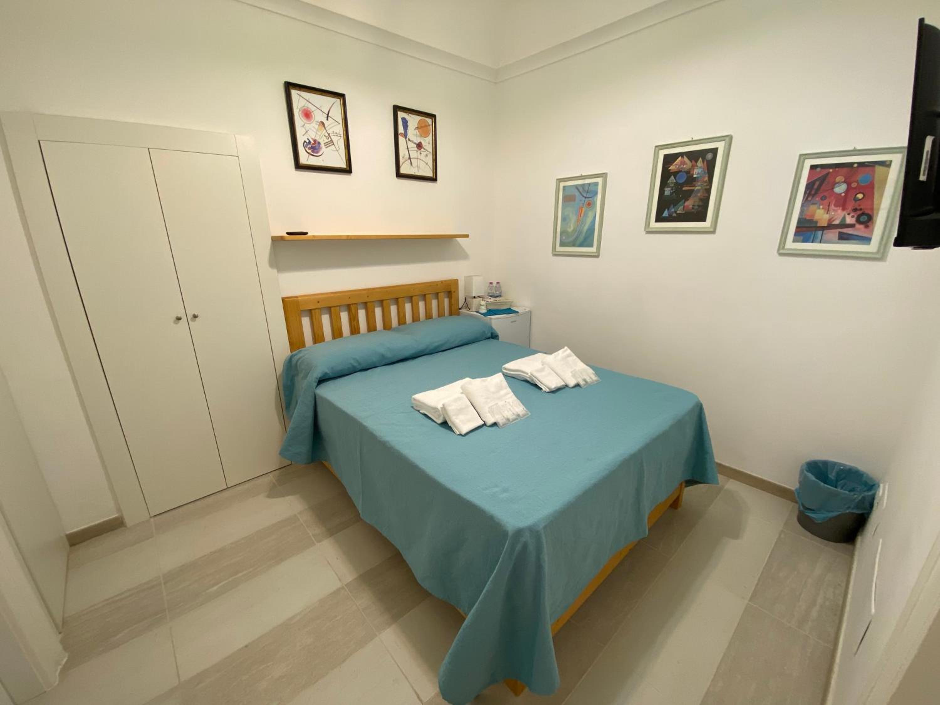 Quadruple Room with Private Bathroom