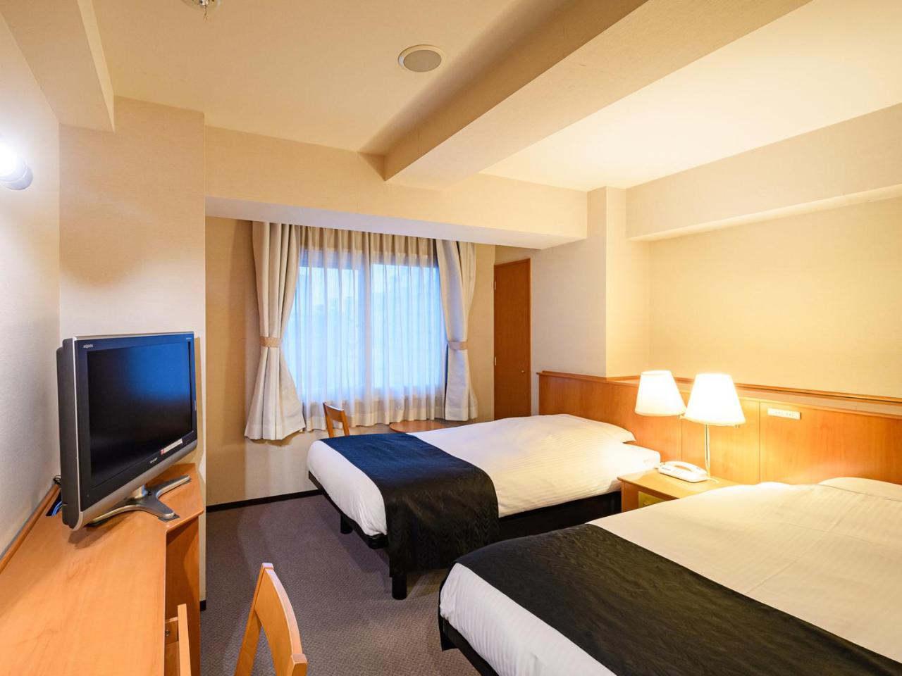 Twin Room - Non-Smoking photo 1