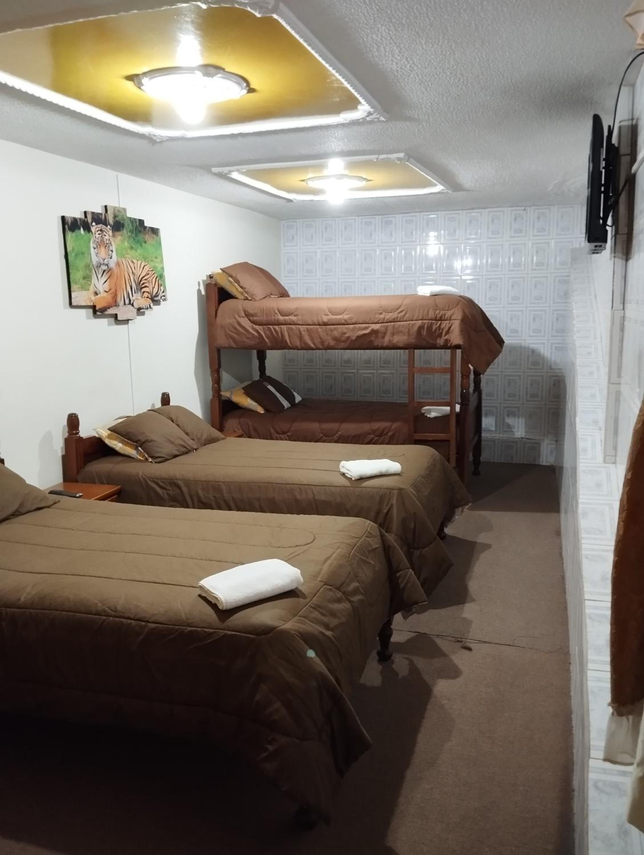 Quadruple Room with Private Bathroom photo 1