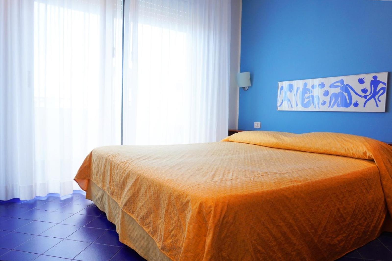 One-Bedroom Apartment with Balcony and Lateral Sea View