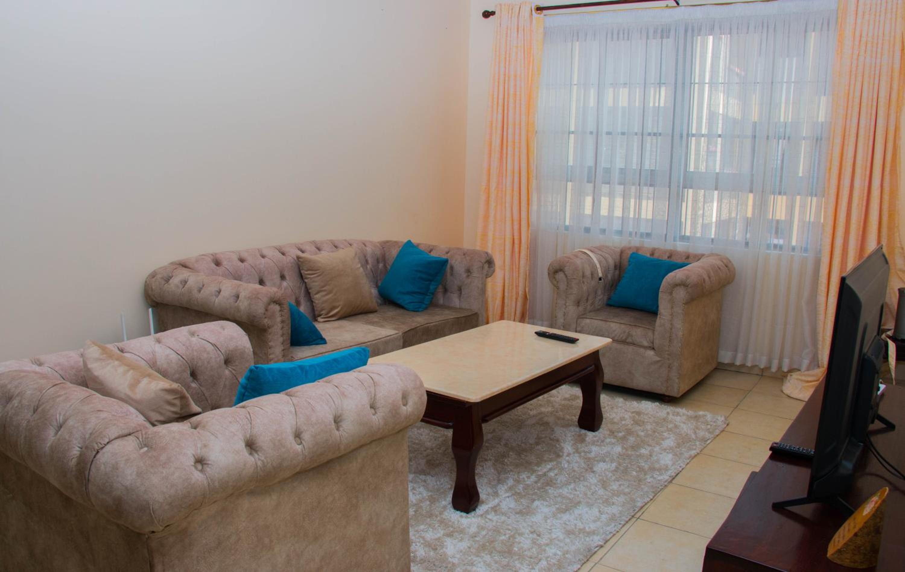 Three-Bedroom Apartment photo 1