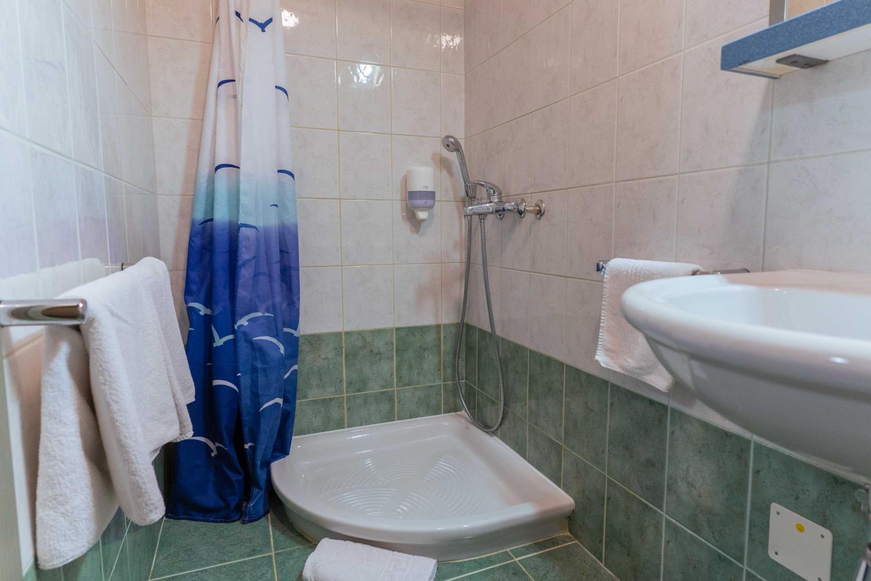 Quadruple Room with Balcony photo 3