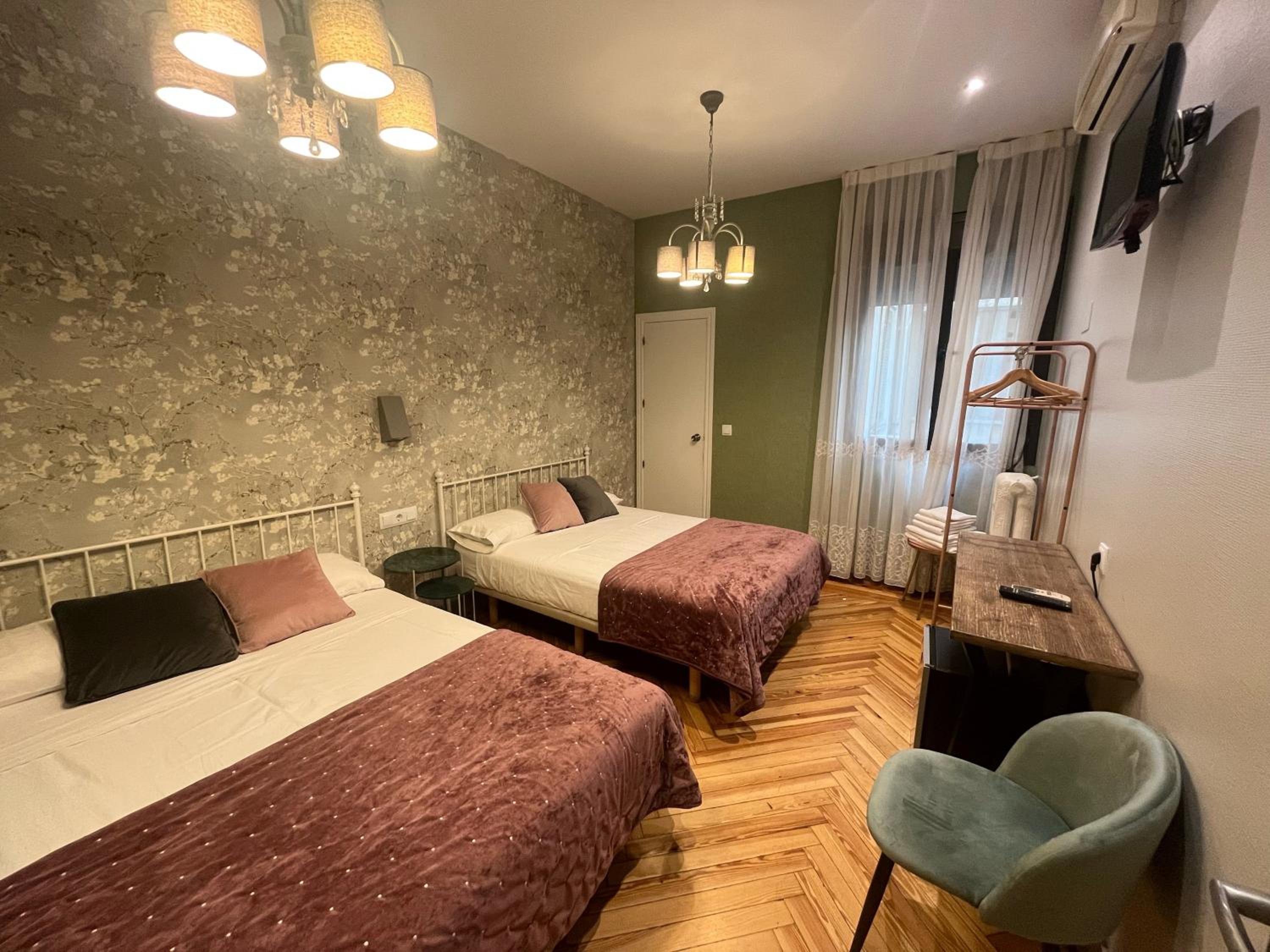 Habitación Doble con Dos Camas Dobles