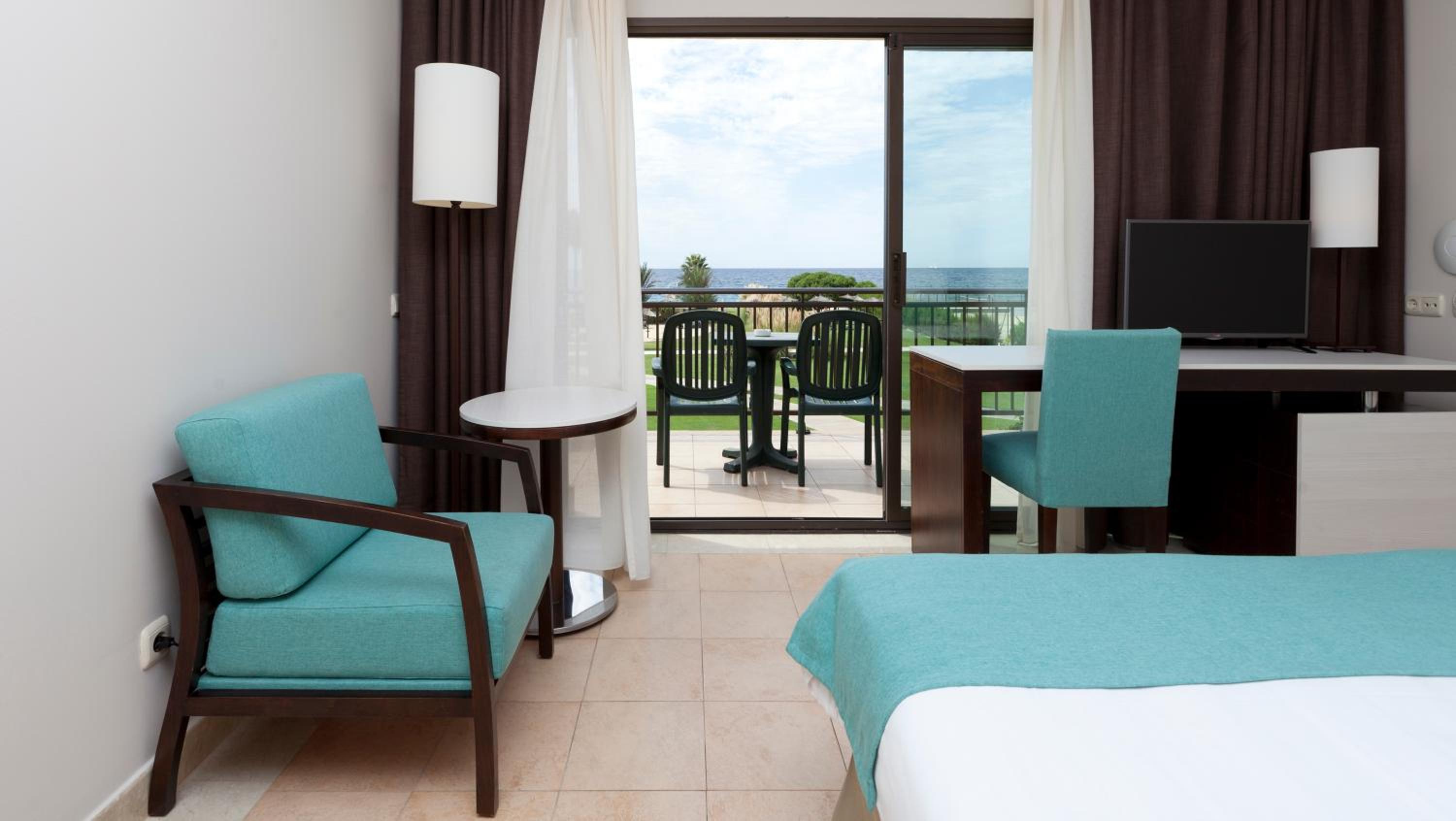 Habitación Doble con Vista al Mar (1 Adulto + 1 Niño)