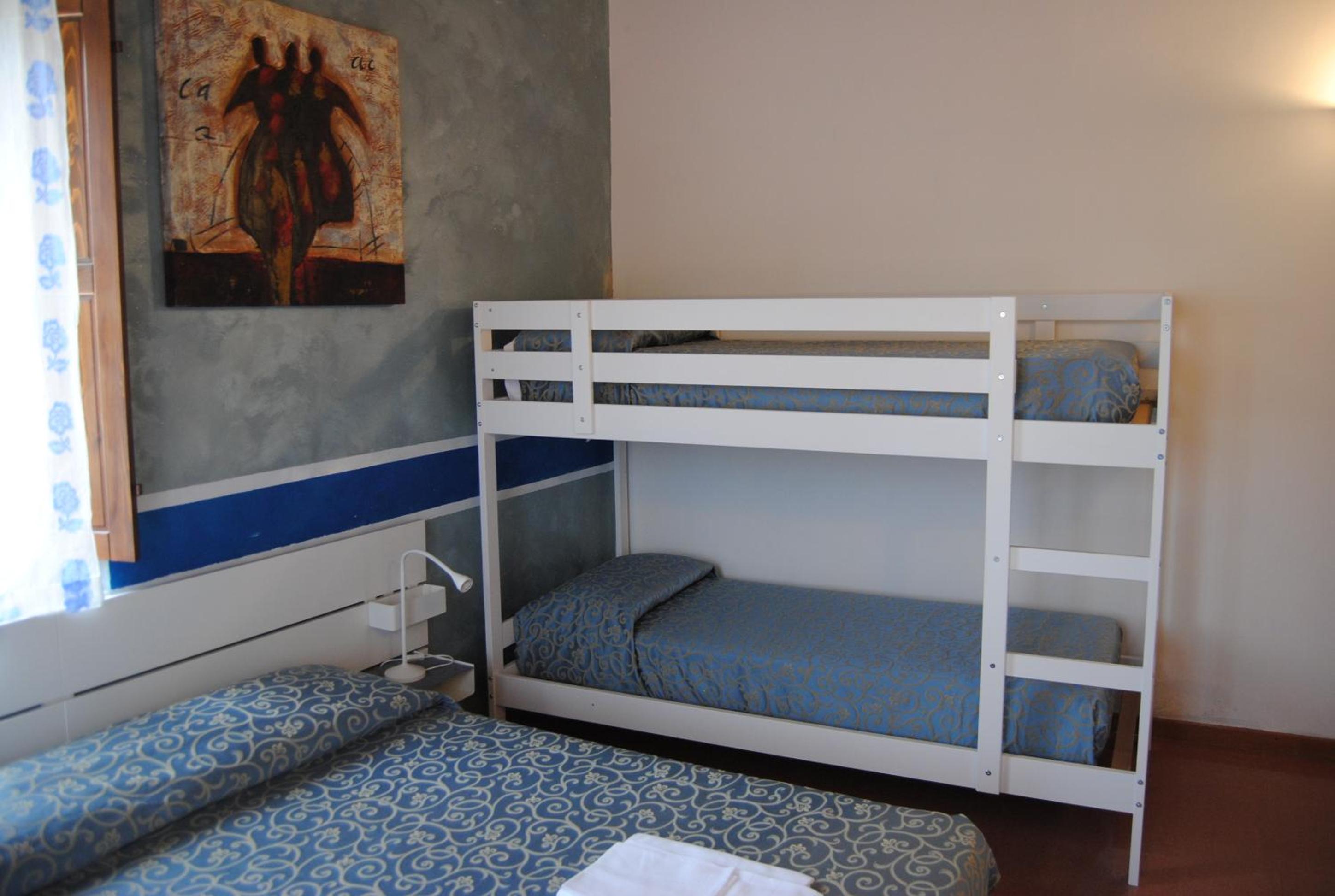 Quadruple Room with Private Bathroom - Photo 1