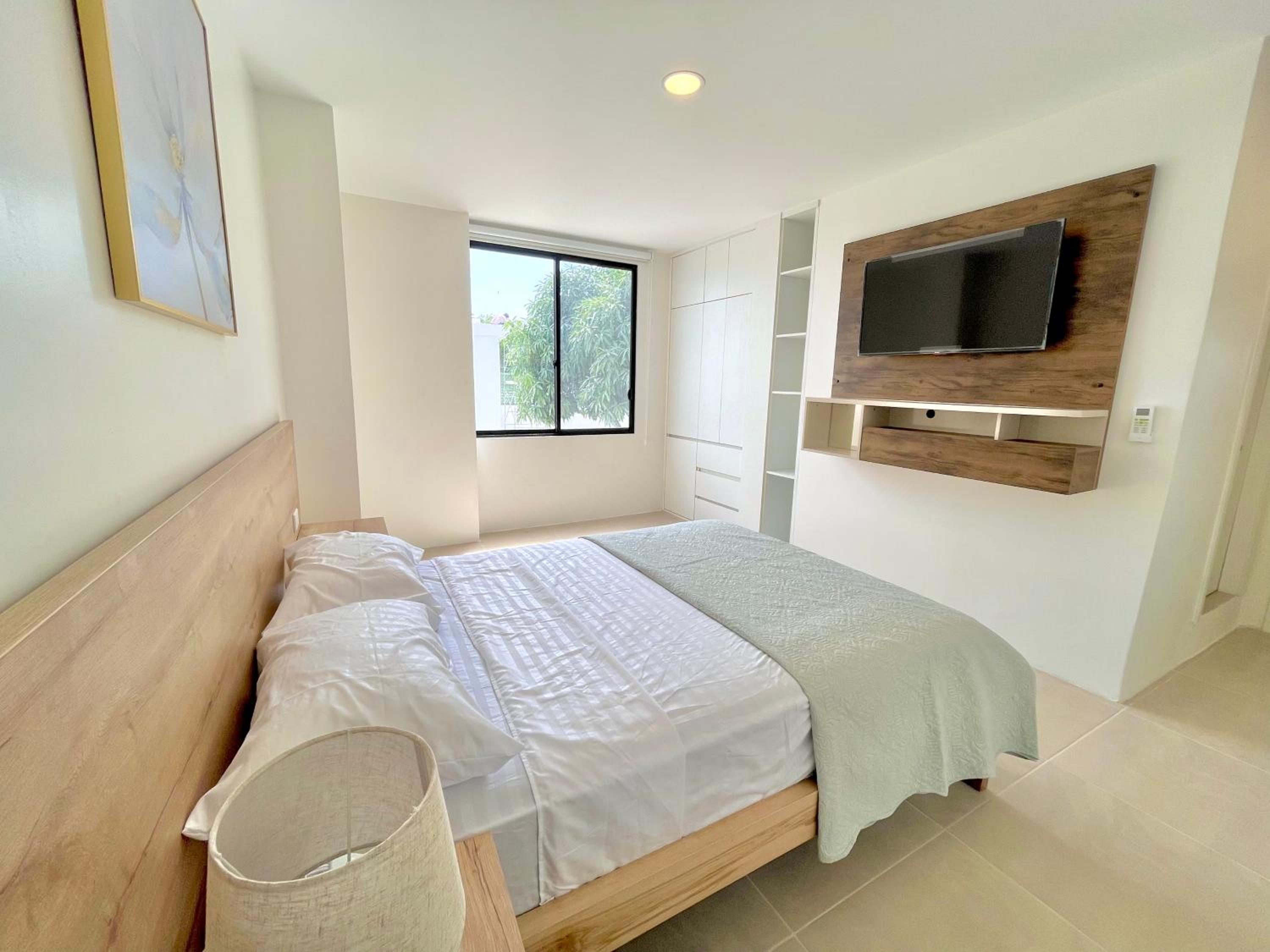Three-Bedroom Apartment photo 1