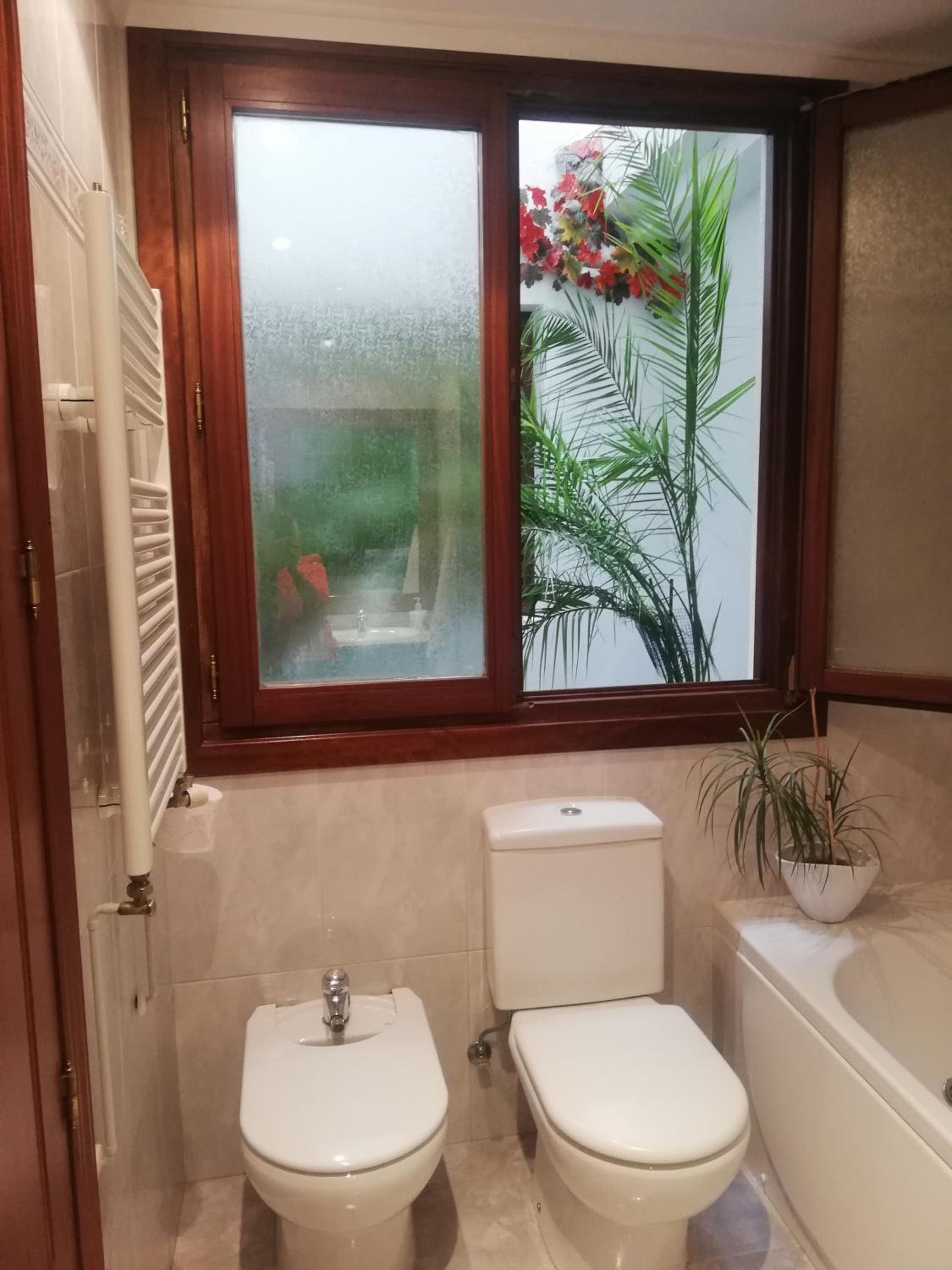 Three-Bedroom House - Photo 18