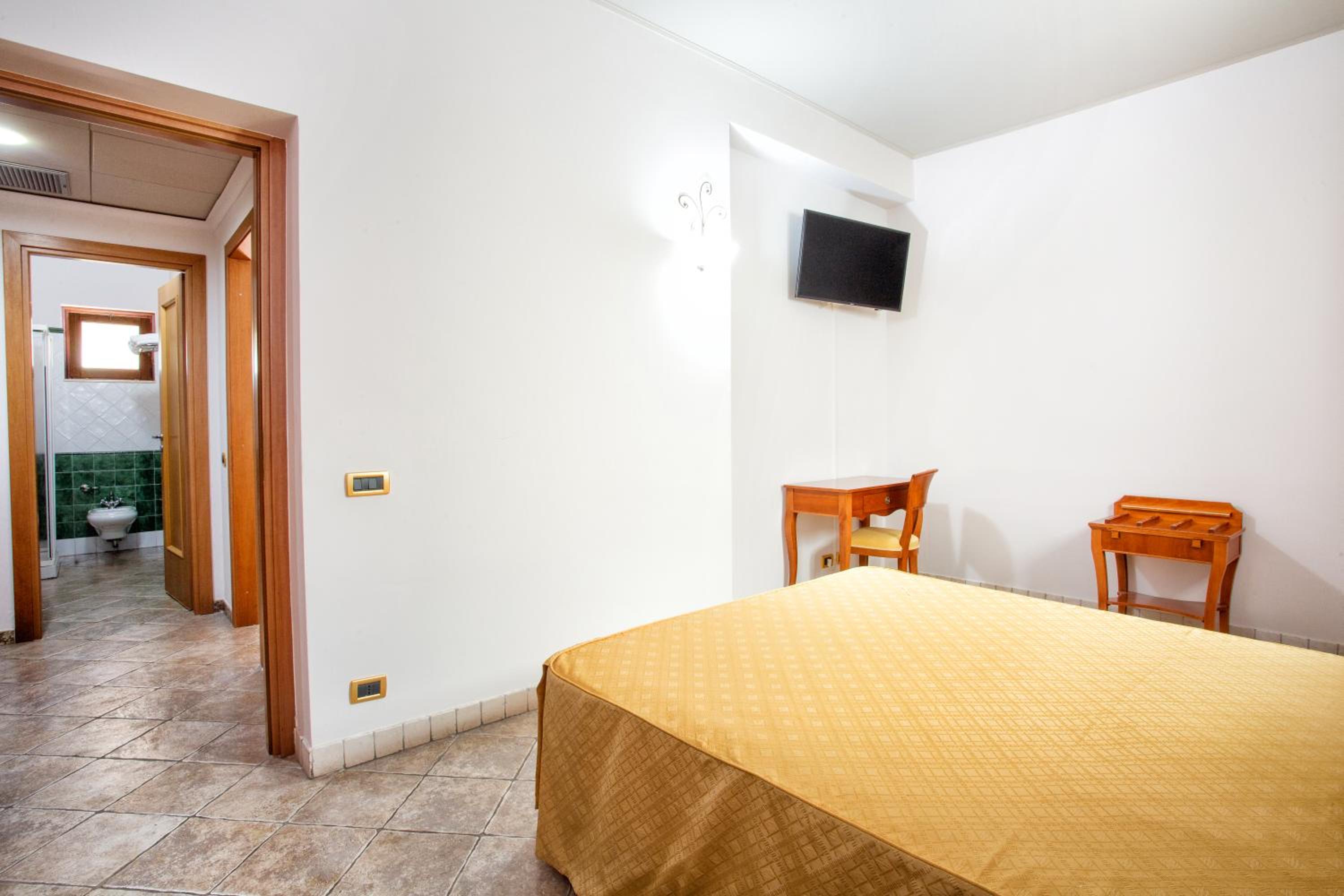 Standard Quadruple Room - Photo 7