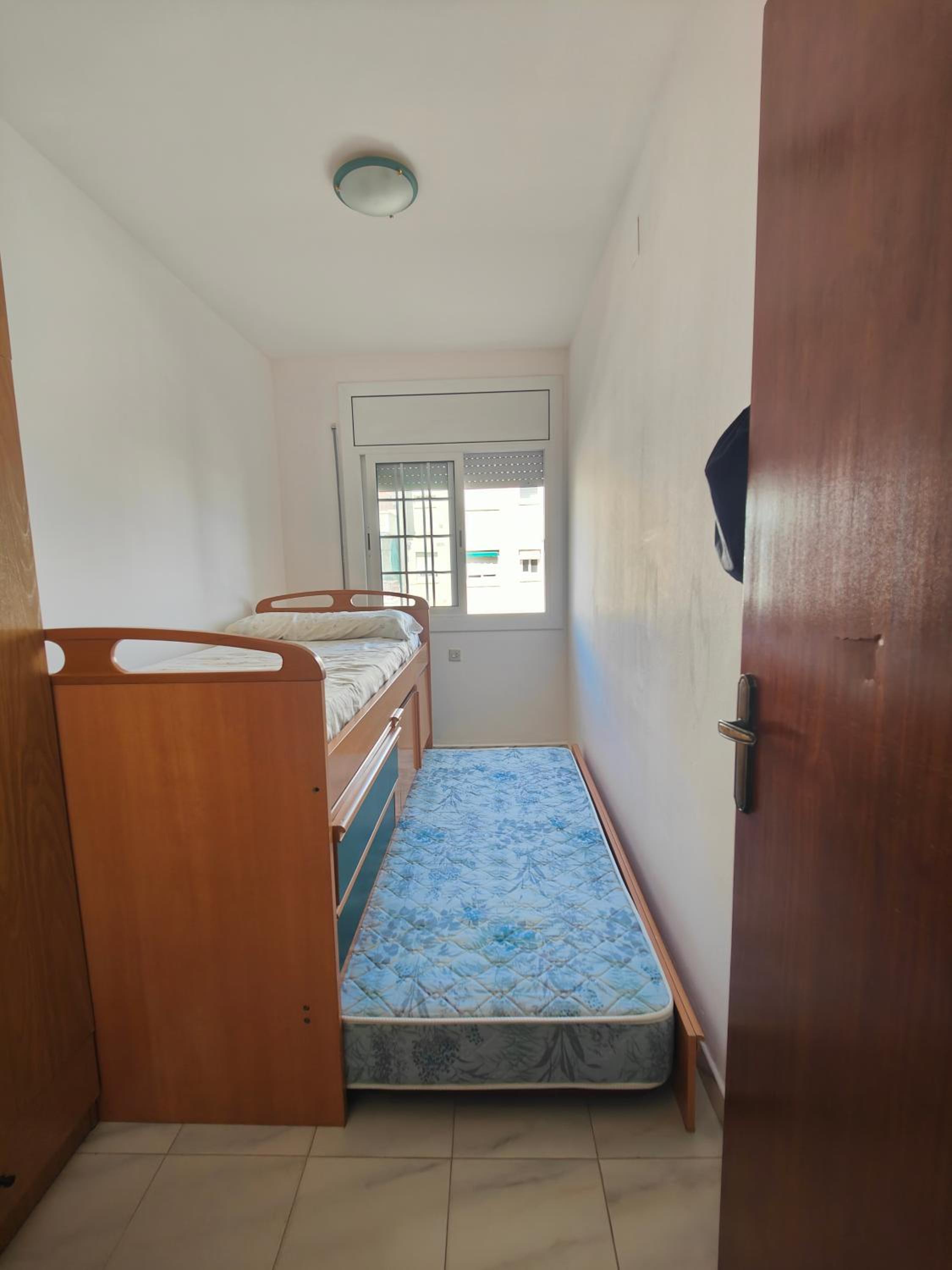 Three-Bedroom Apartment photo 2