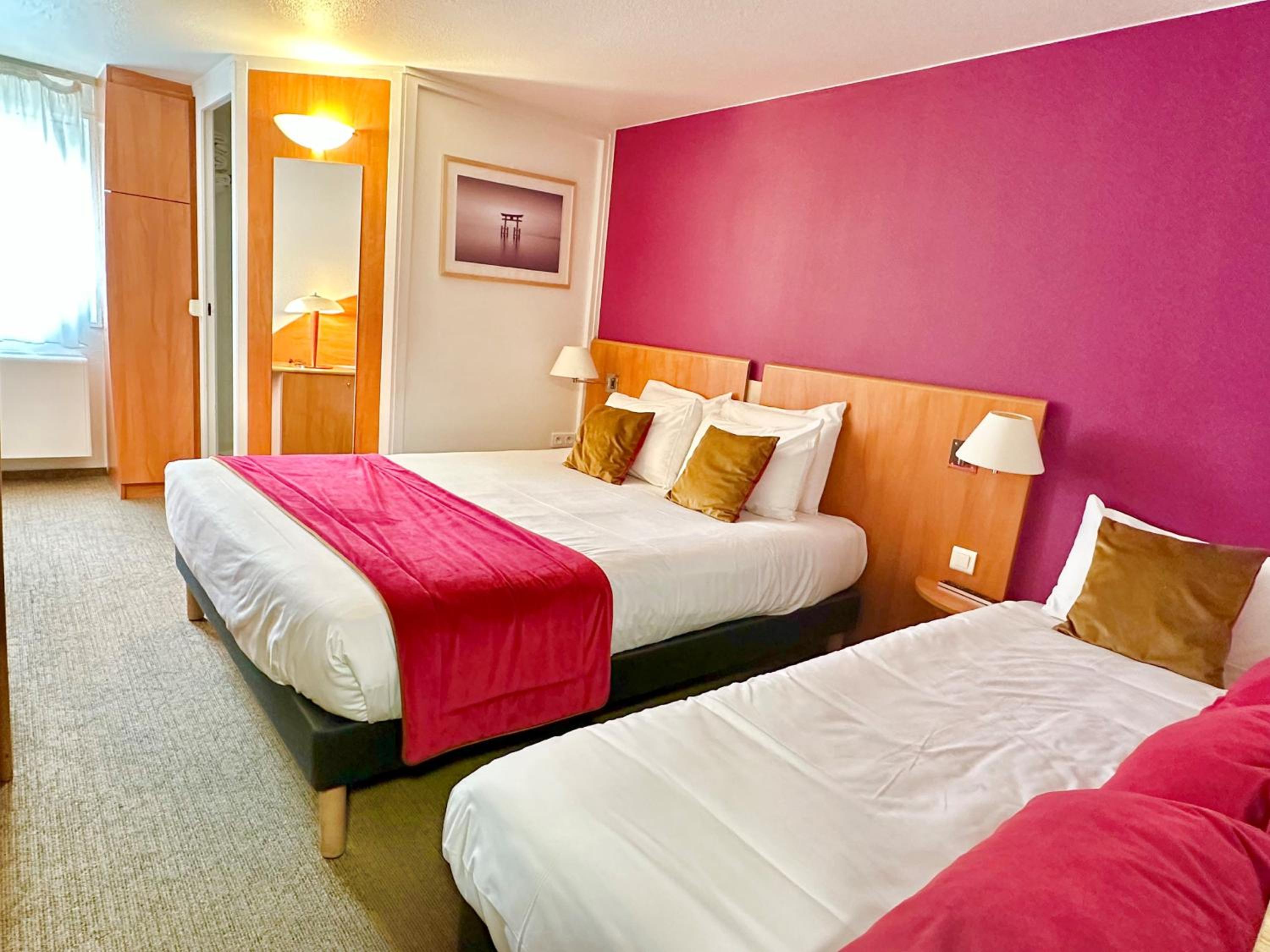 Triple Room (1 Double Bed + 1 Single Bed)