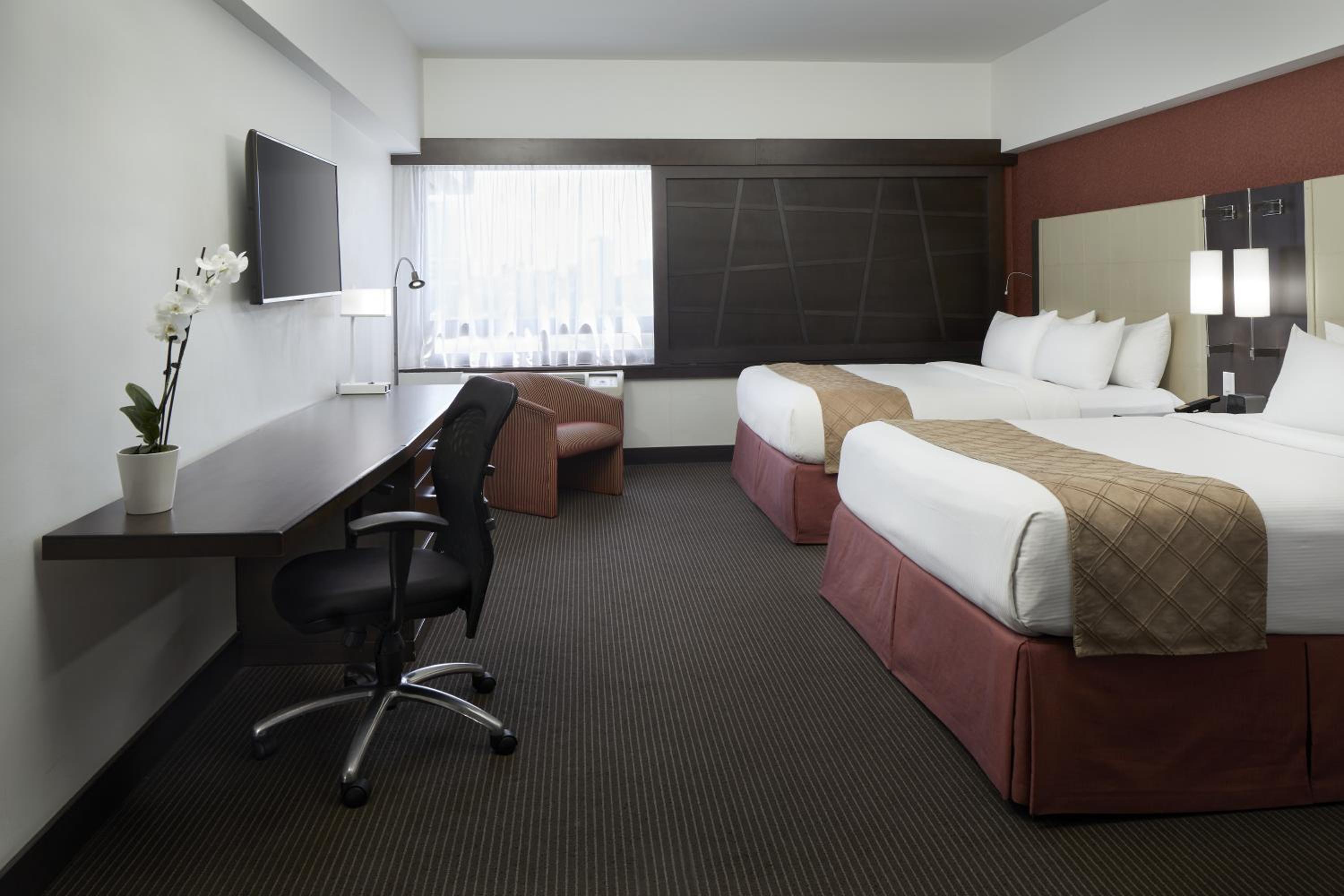 Standard Queen Room with Two Queen Beds - Photo 1