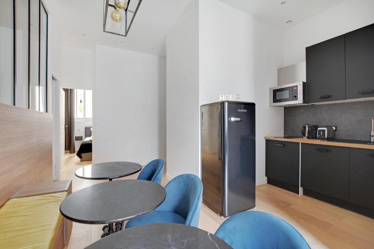 Three-Bedroom Apartment photo 2