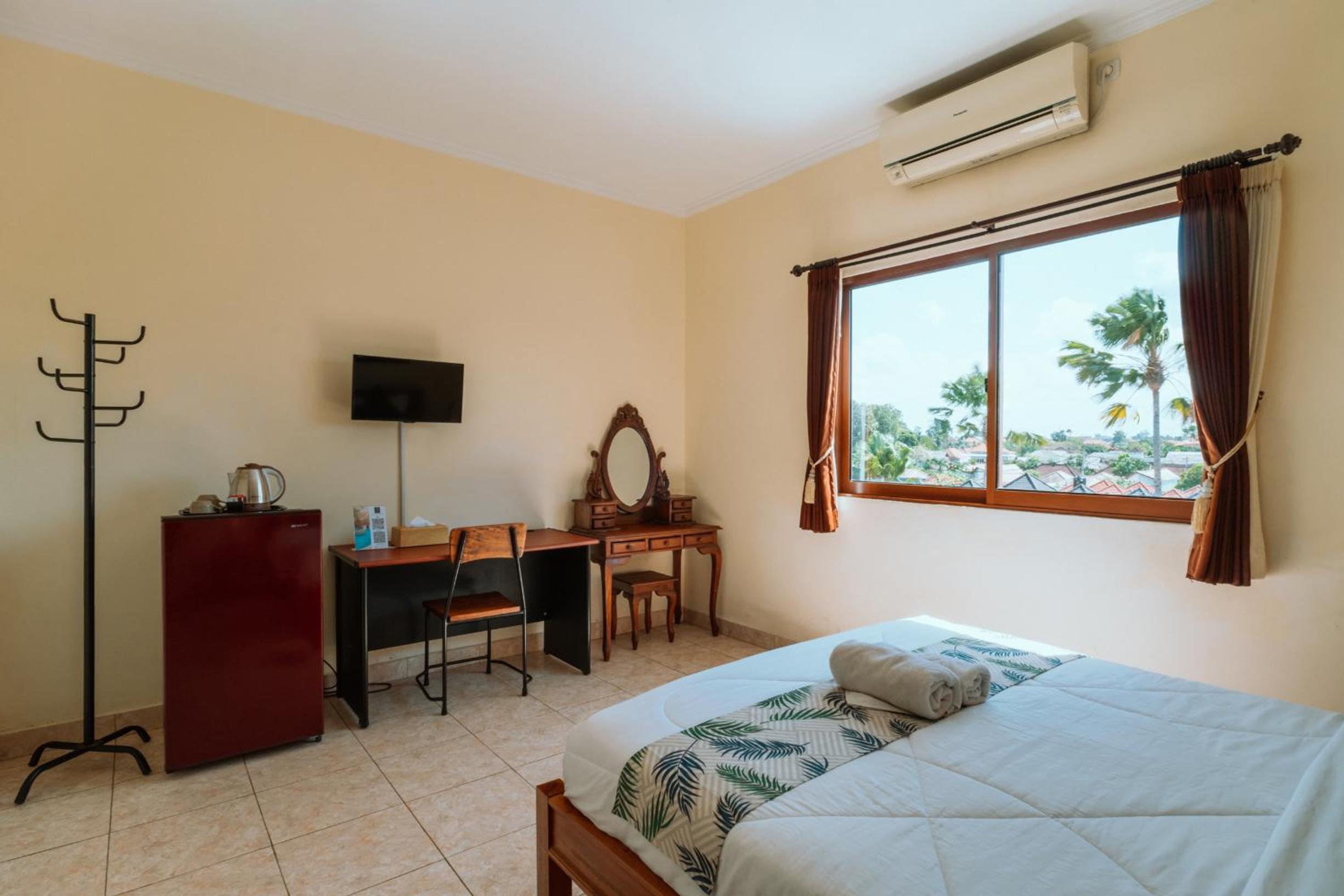Deluxe Room - Photo 10