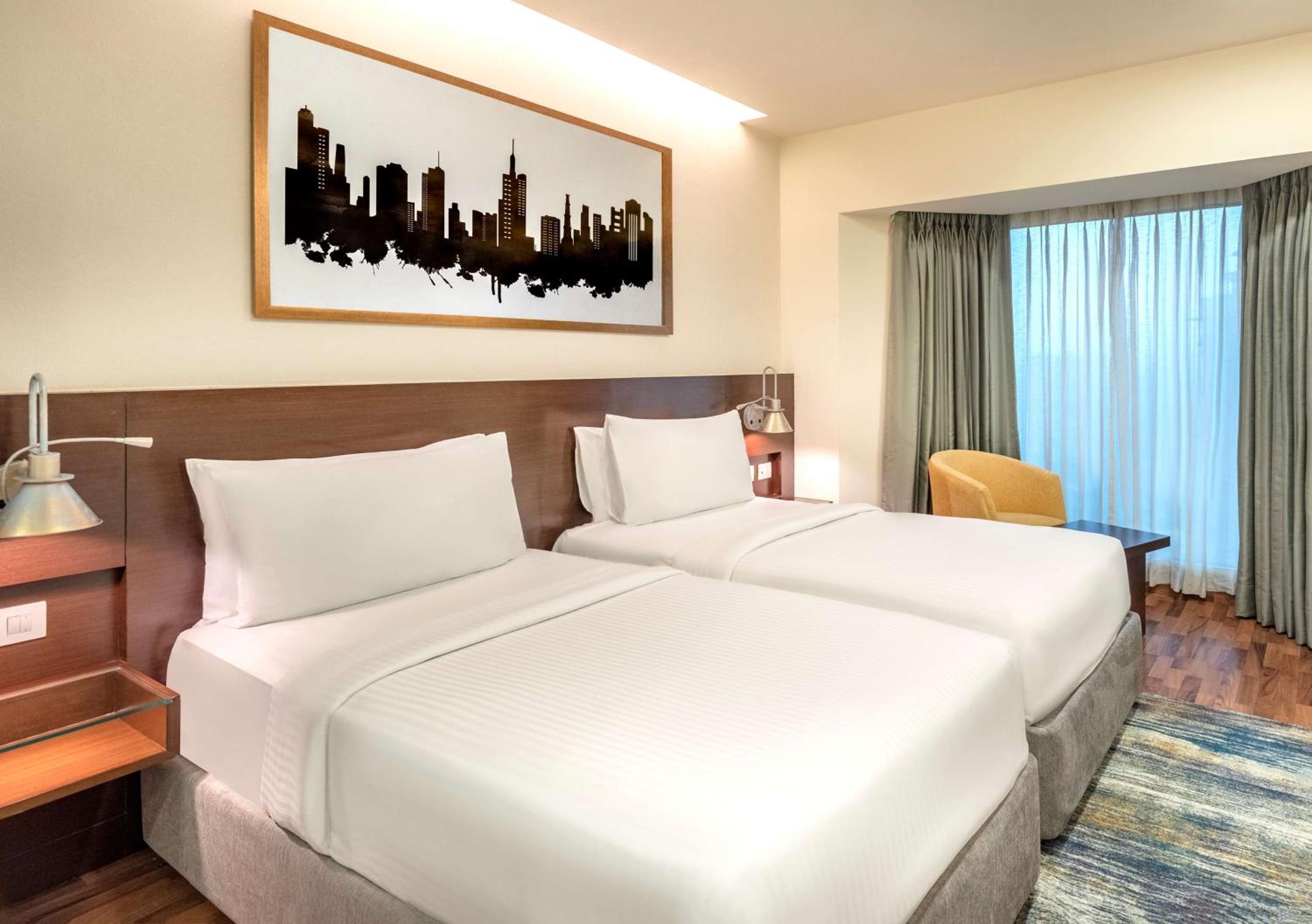 Superior Double or Twin Room with 20% Discount on food and soft beverages, Laundry and liquor and spa, INR 500 credit,one mug of freshly brewed beer during the stay ((330 ml)