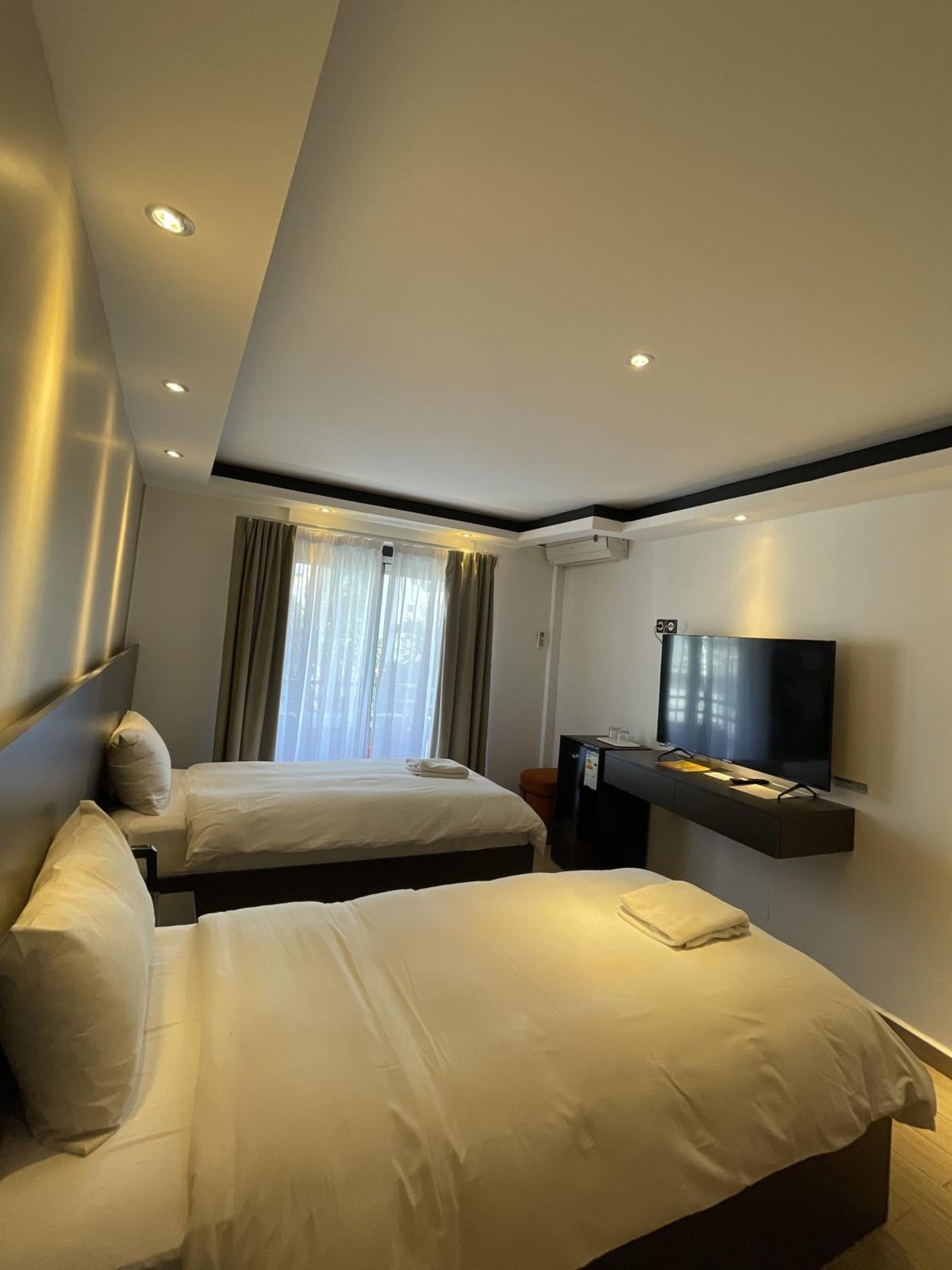 Twin Room - Photo 1