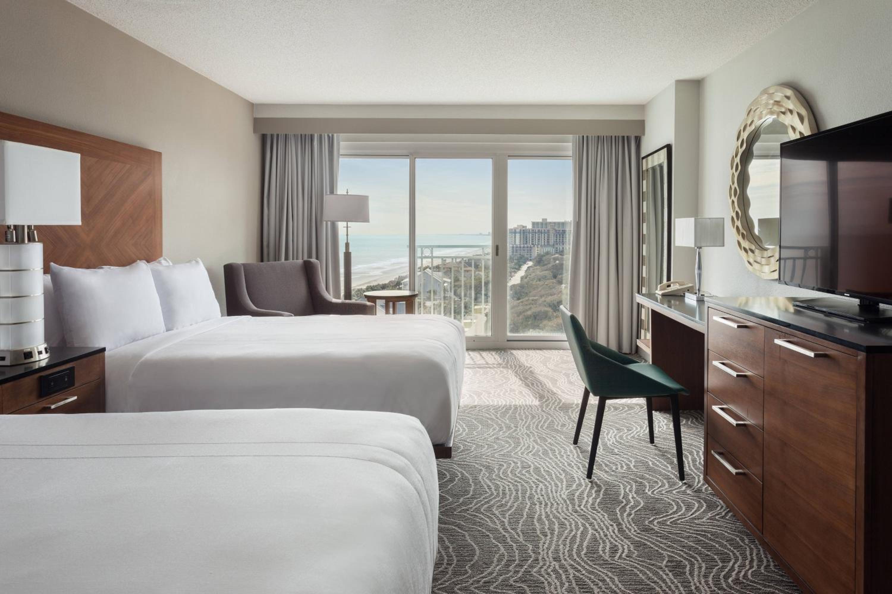 Queen Room with Two Queen Beds and Partial Ocean View - Photo 1