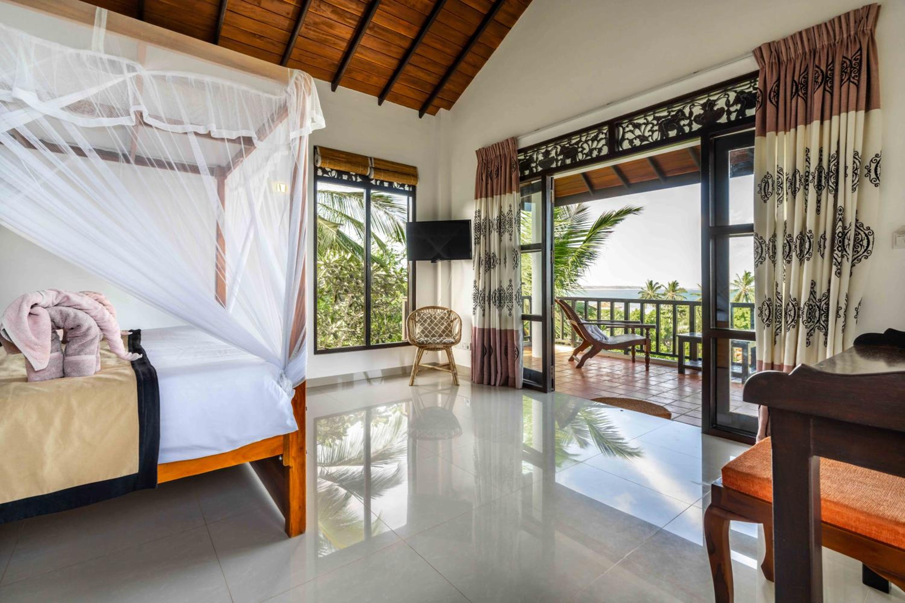 De Luxe Doppelzimmer mit Balkon und Meerblick