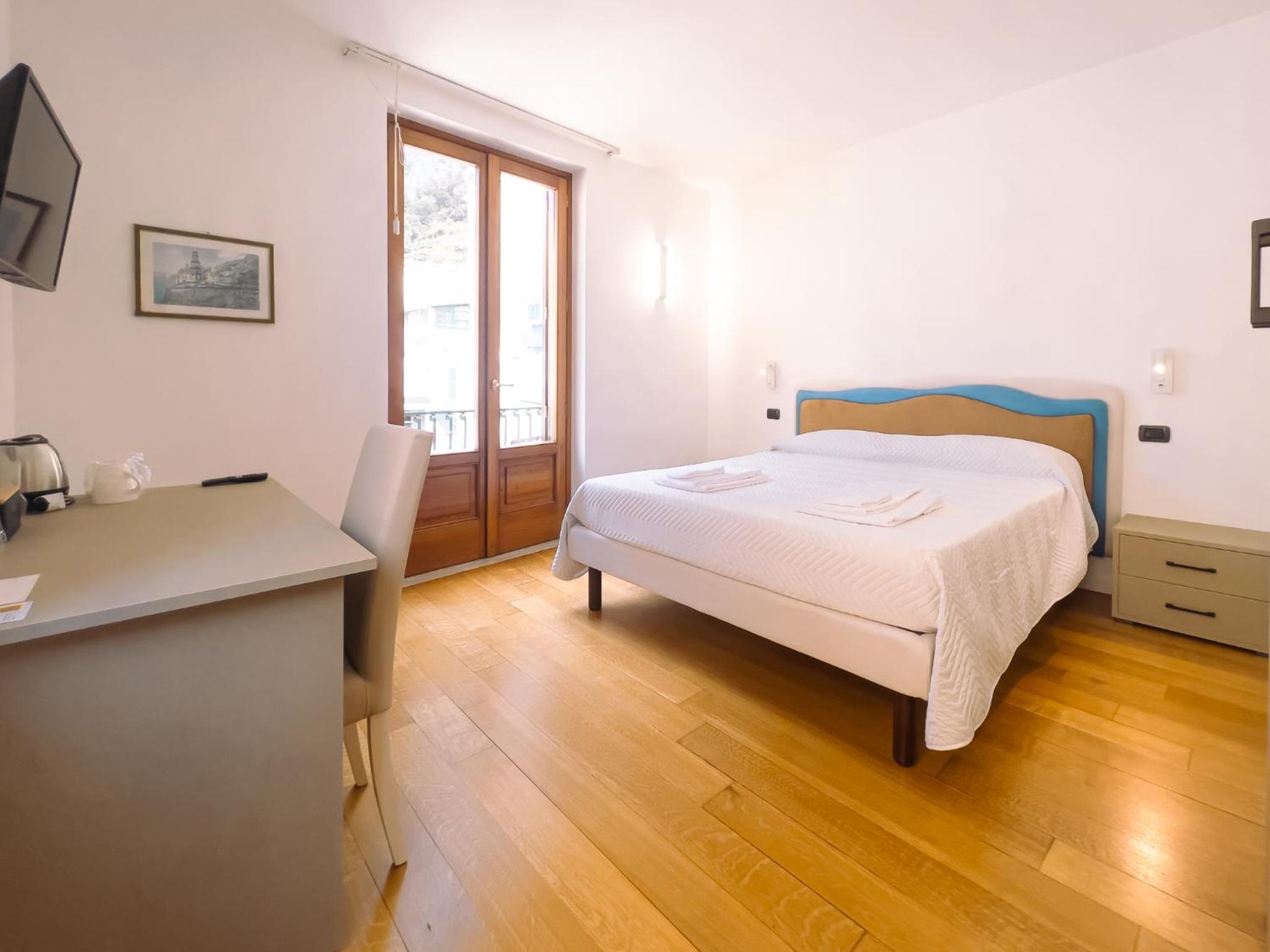 Quadruple Room with Balcony photo 2