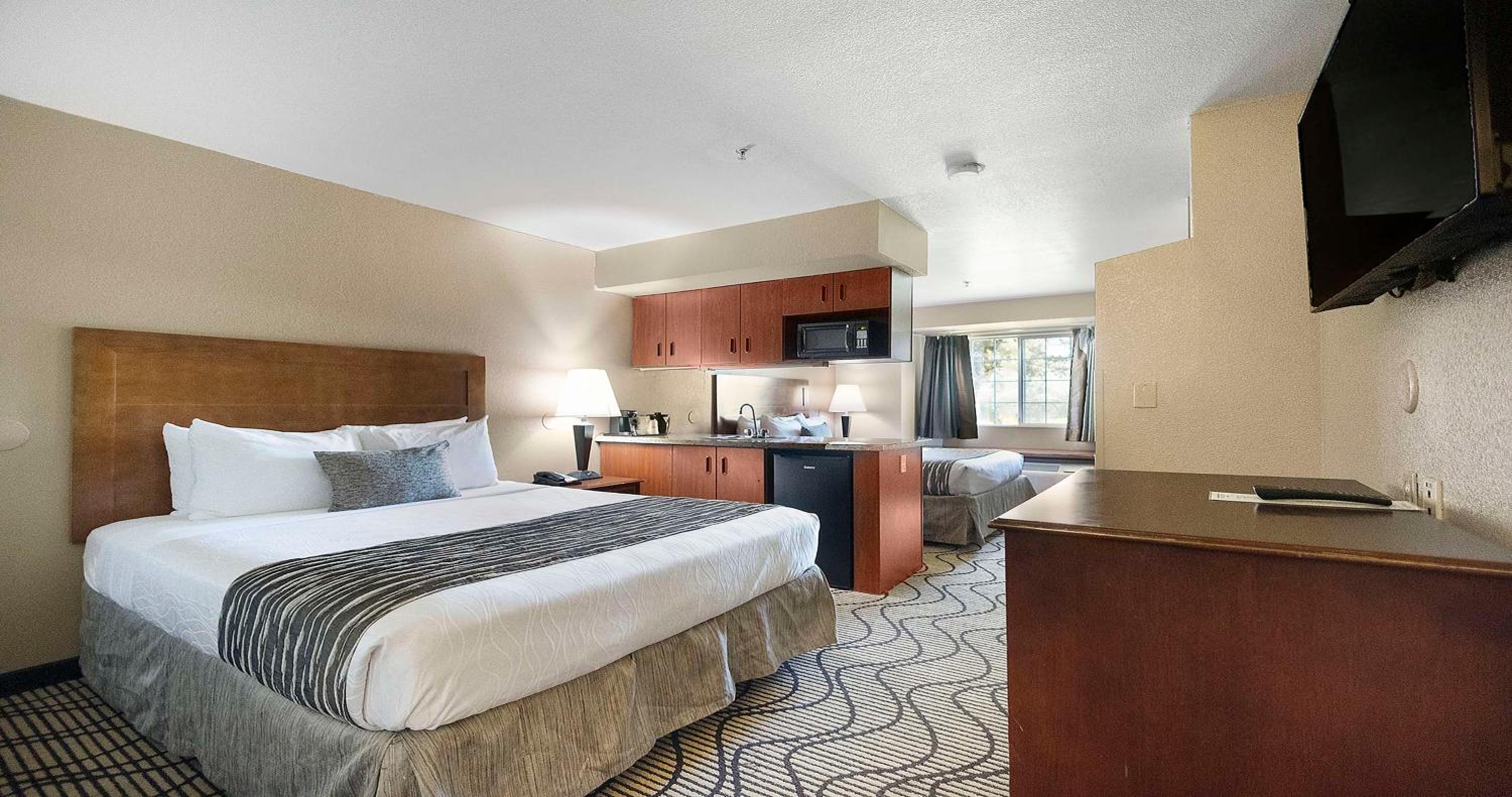 Queen Room with Two Queen Beds and Wet Bar - Photo 1