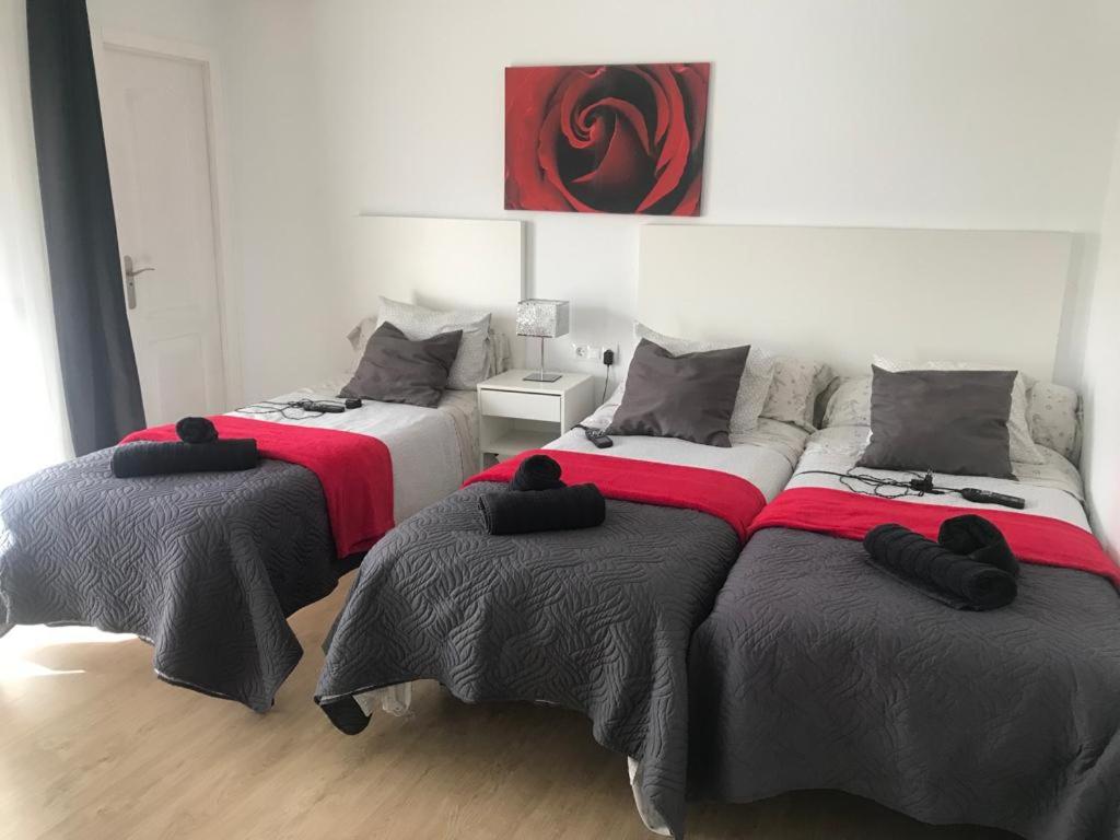 Habitación Triple con Balcón