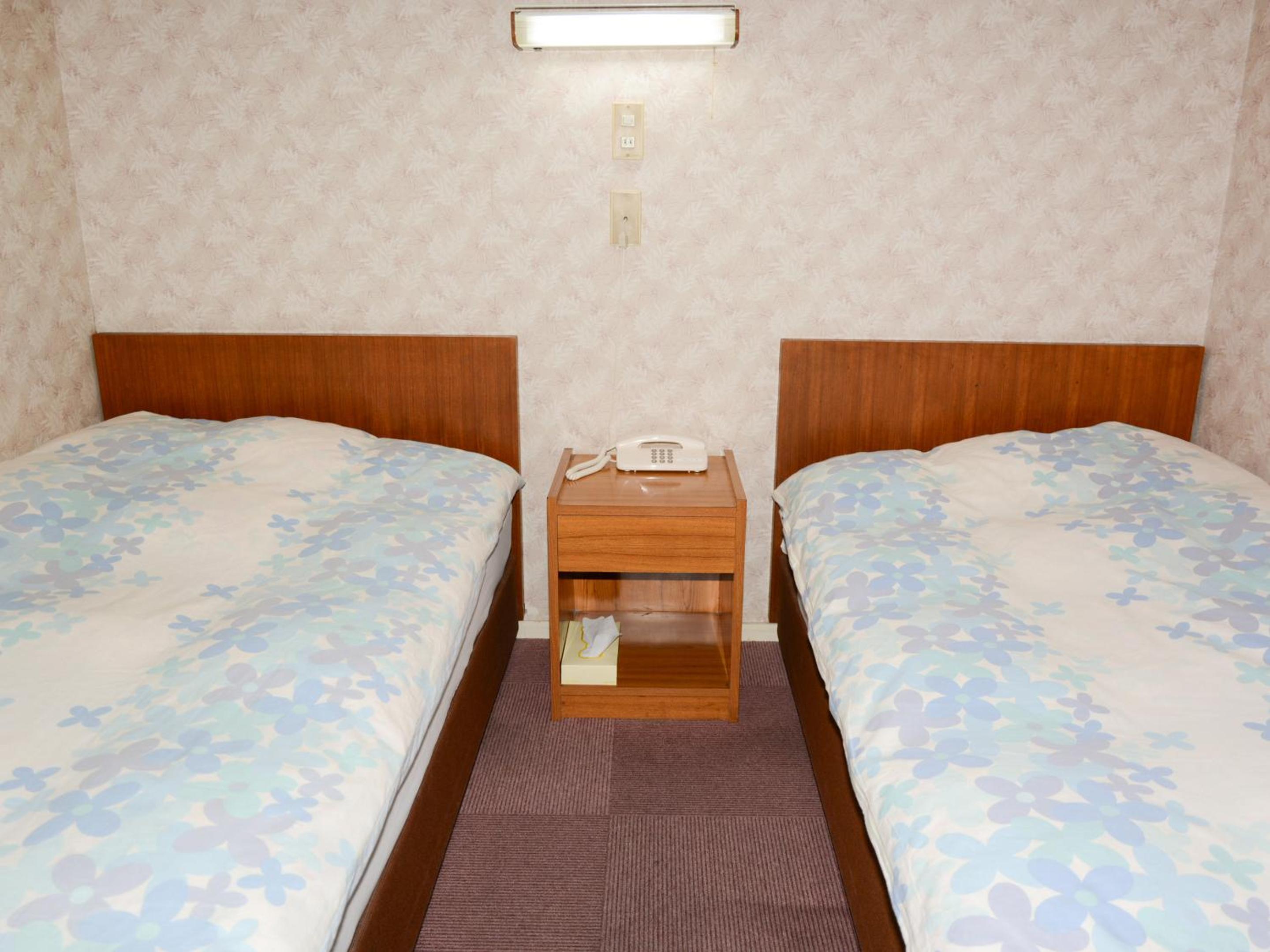 Twin Room - Photo 1