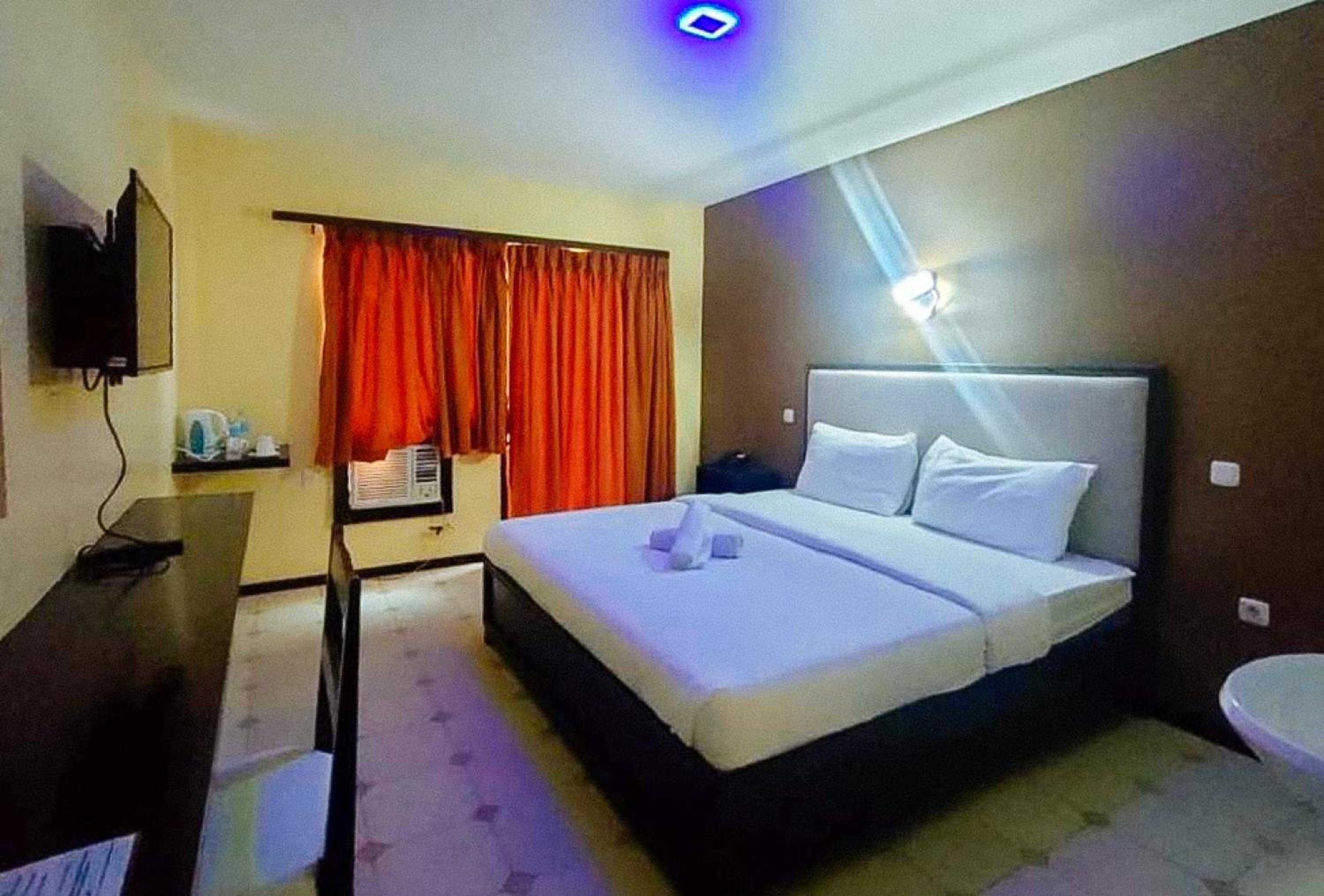 Deluxe Room - Photo 1