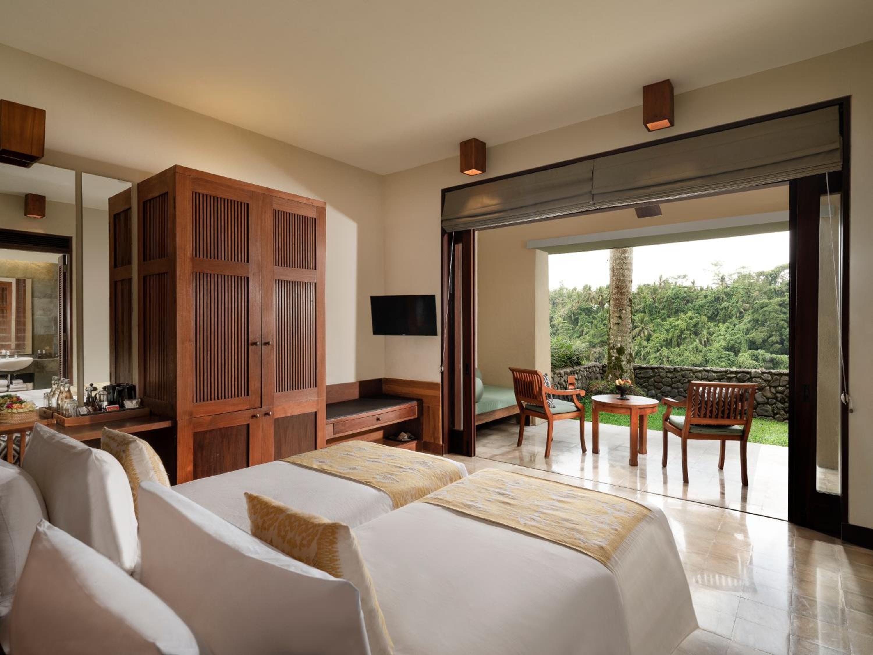 Deluxe Twin Room ,Daily Afternoon Tea, Complimentary 60-minute photography session with one photo included, Daily schedule shuttle service to Ubud, Daily wellness activities, Bicycles for personal use around the resort