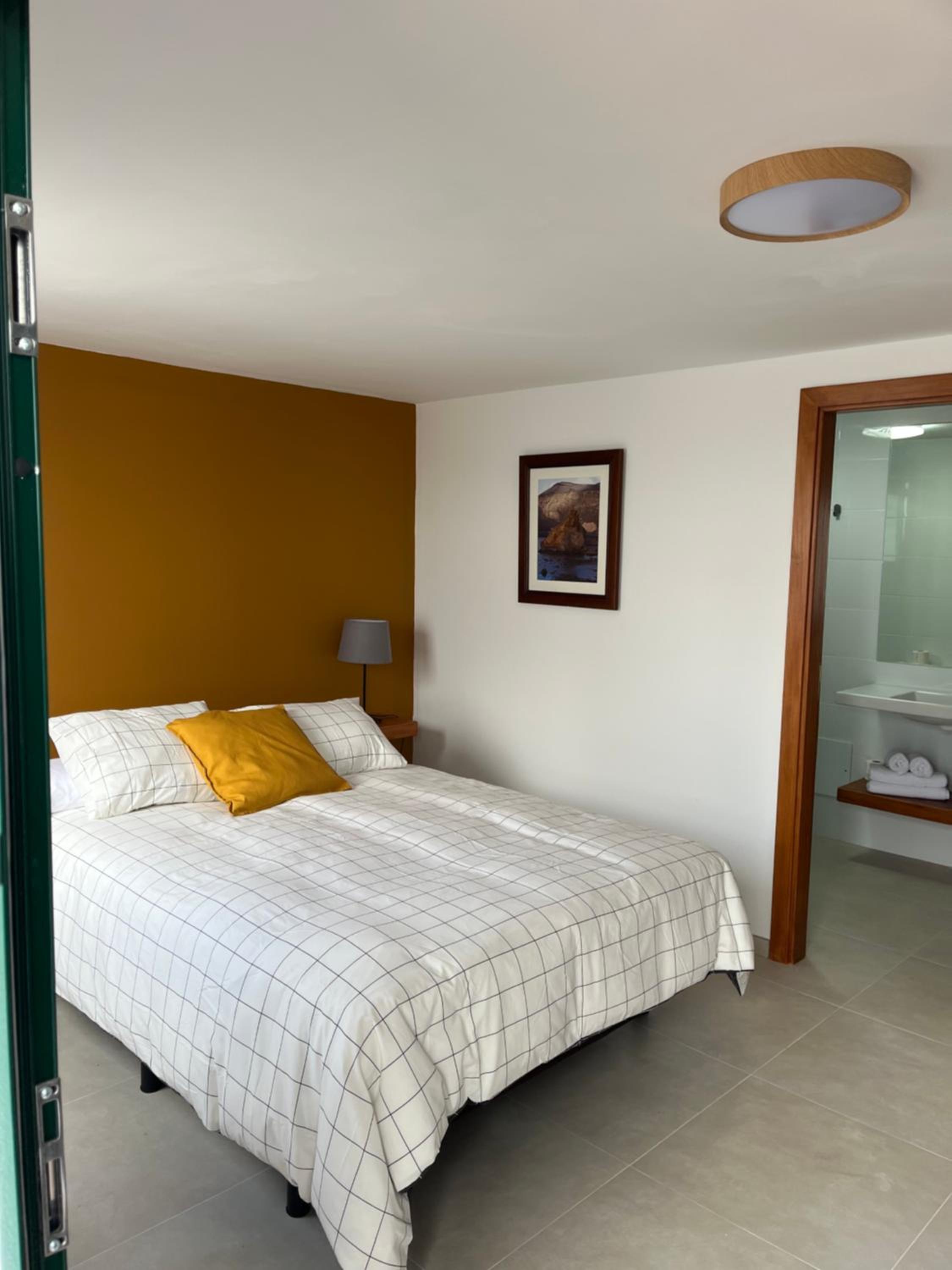 Suite Queen con vista a la piscina