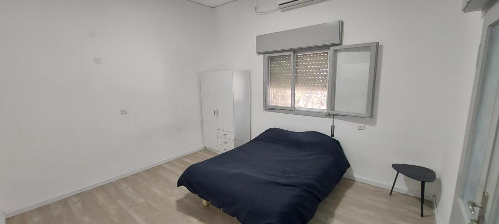 Two-Bedroom Apartment - Photo 33