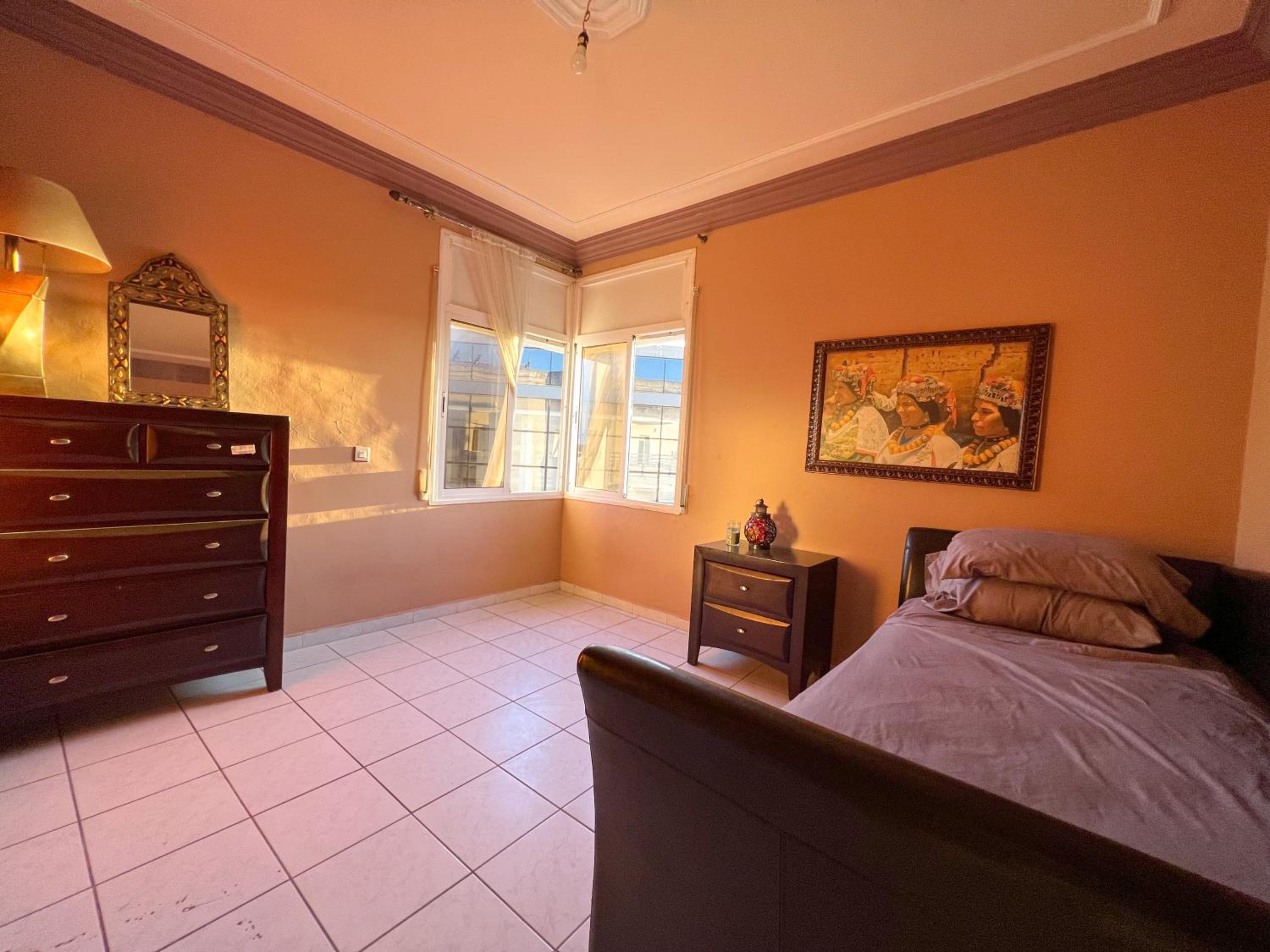 Three-Bedroom Apartment photo 2