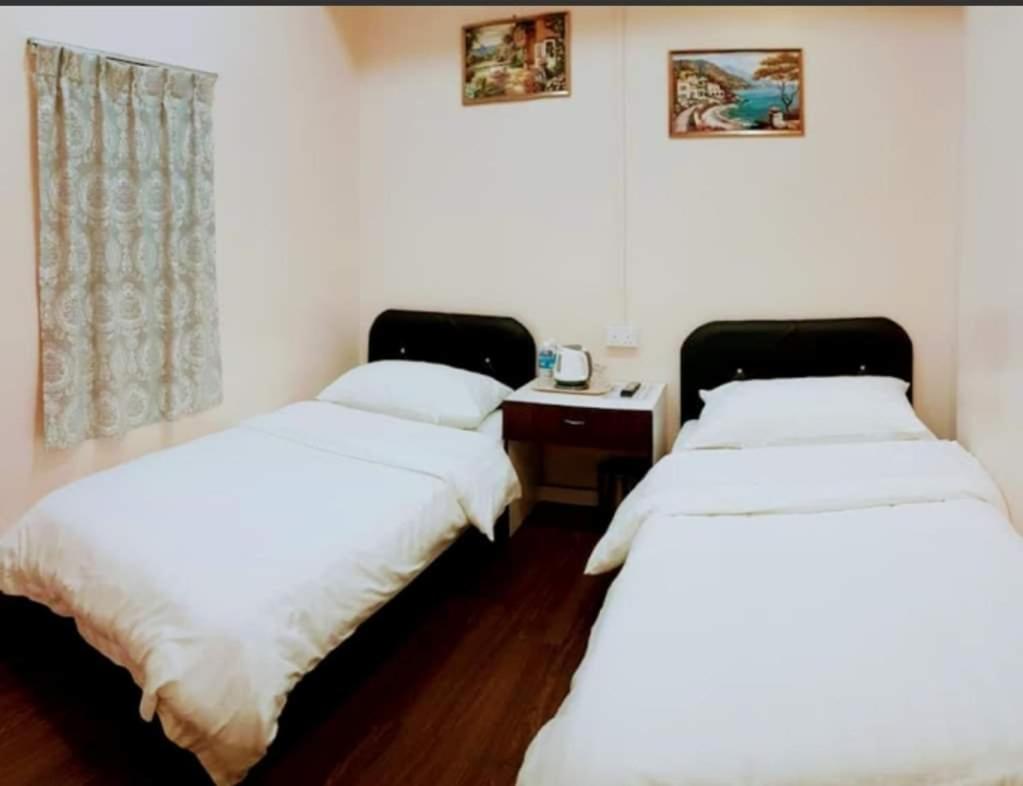 Standard Twin Room - Photo 1