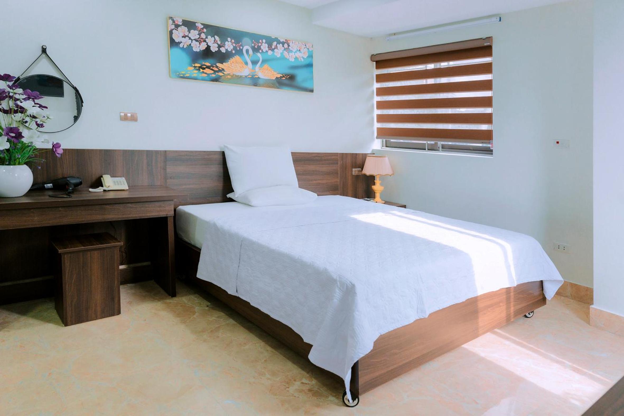 Deluxe Room (2 Adults + 1 Child) - Photo 4
