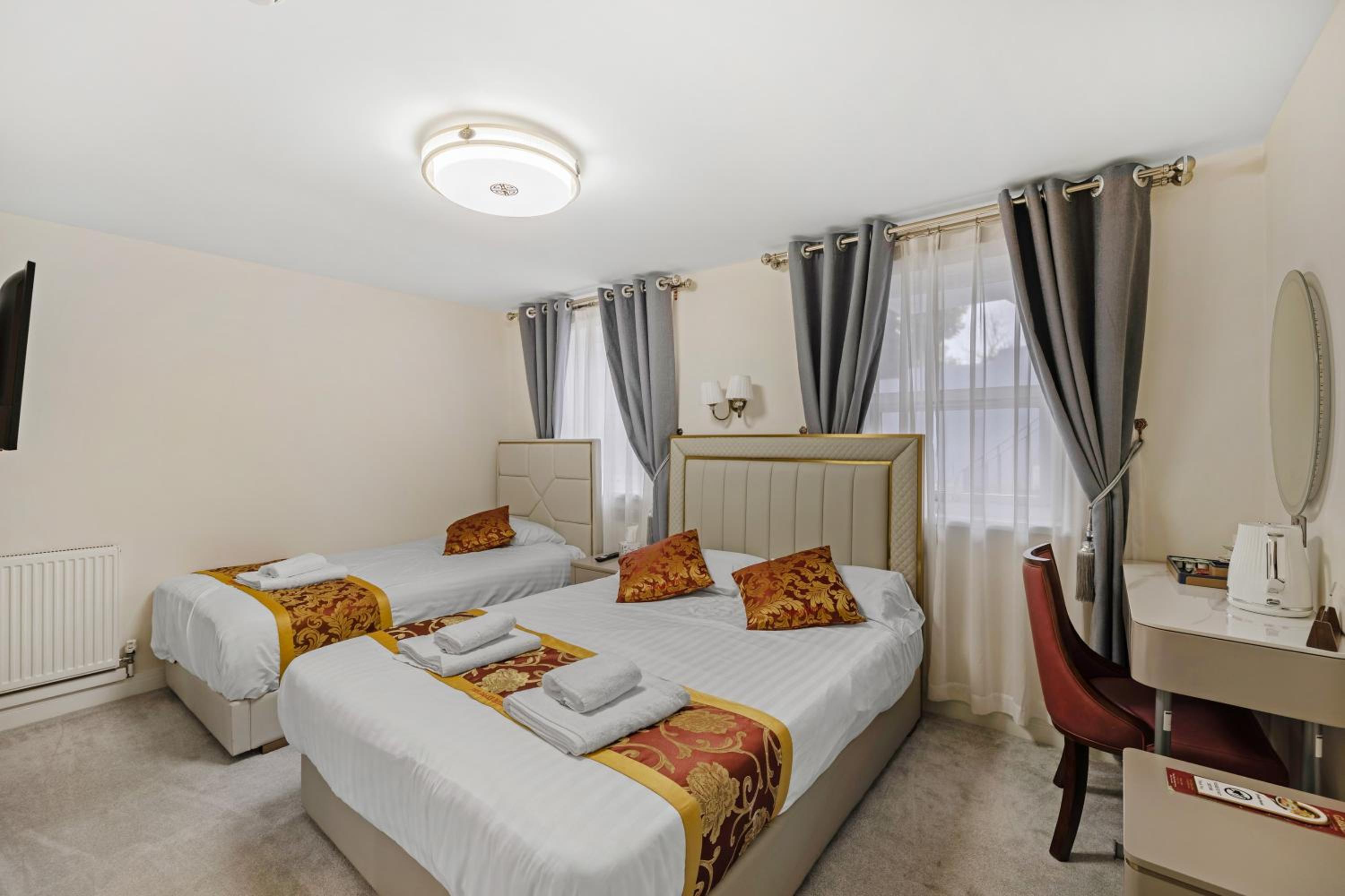 Deluxe Triple Room - Photo 1
