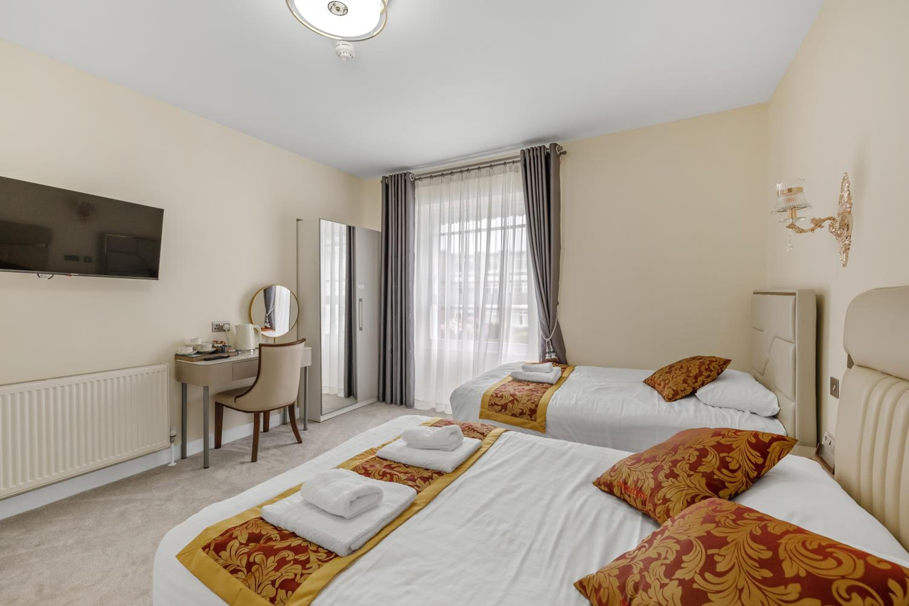 Deluxe Triple Room - Photo 7