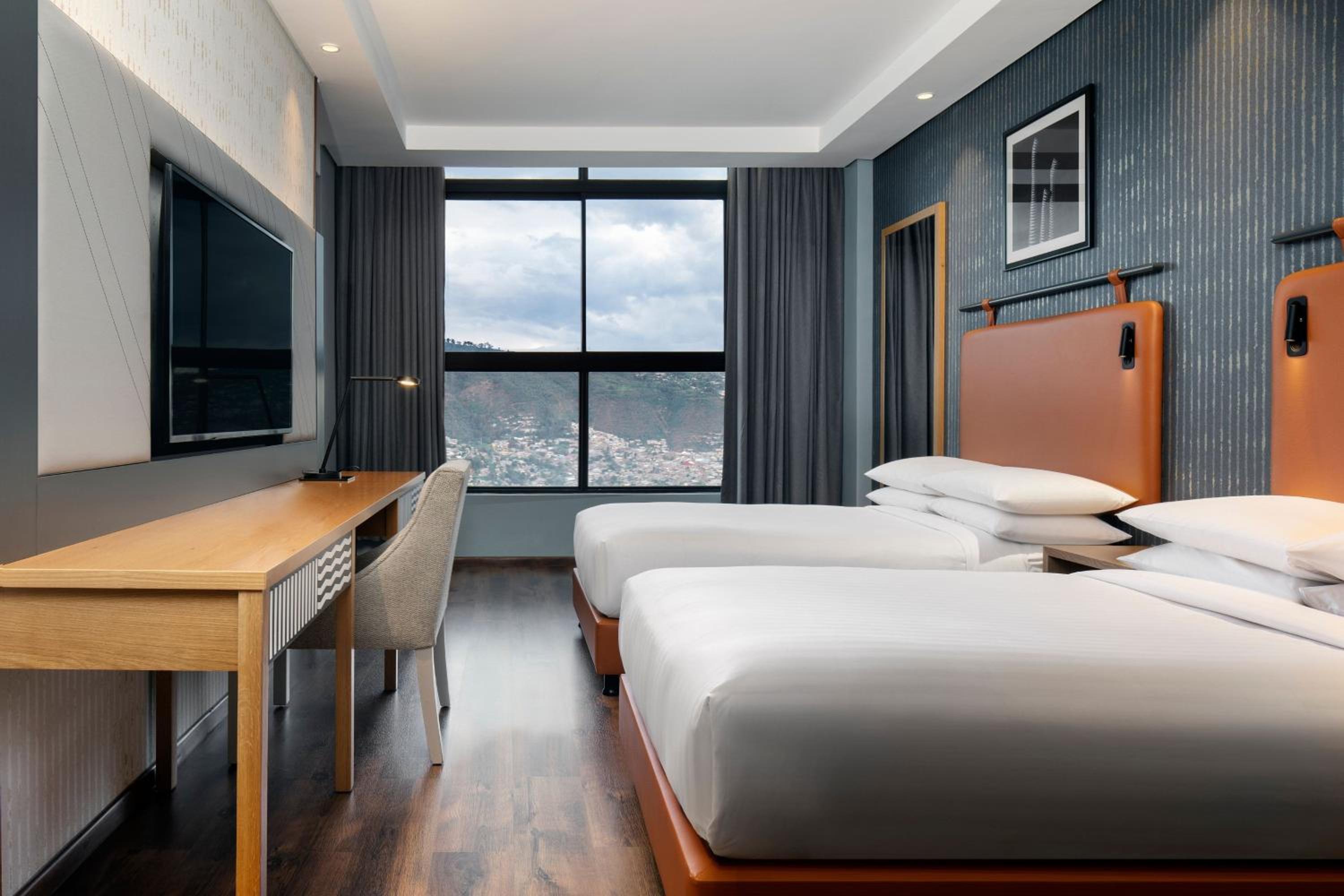 Double Room with Two Double Beds and Inland View - Photo 1