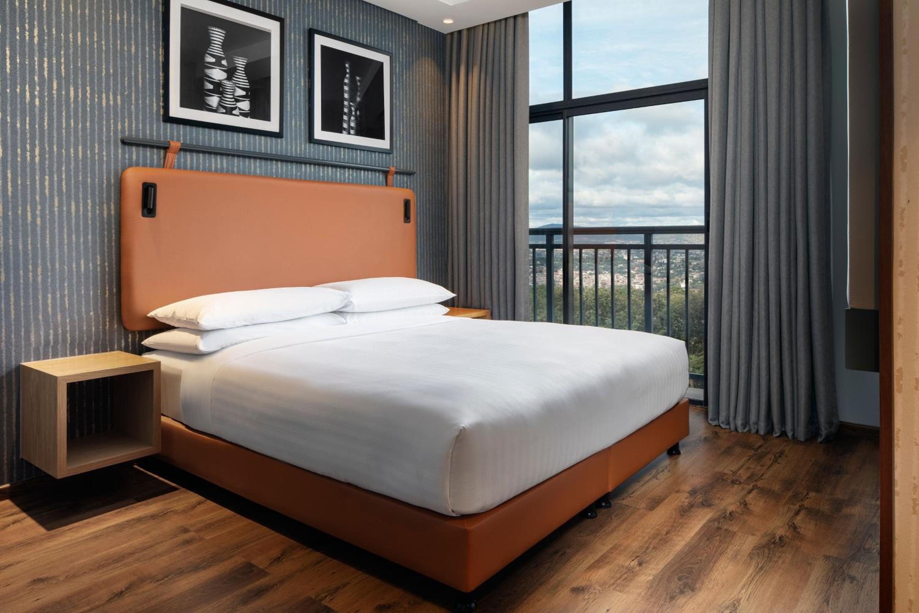 Two-Bedroom Family Suite with City View - Photo 1