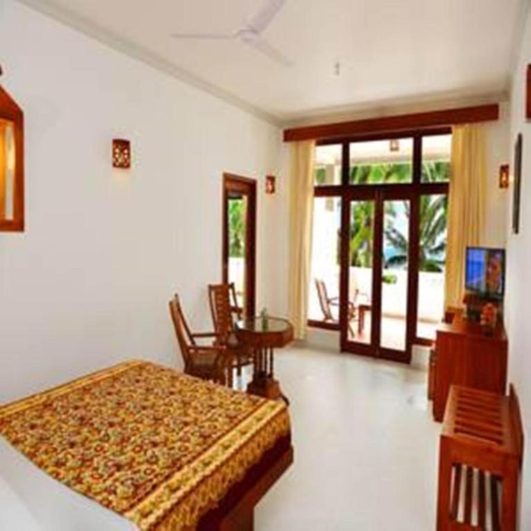 Deluxe Triple Room with Sea View